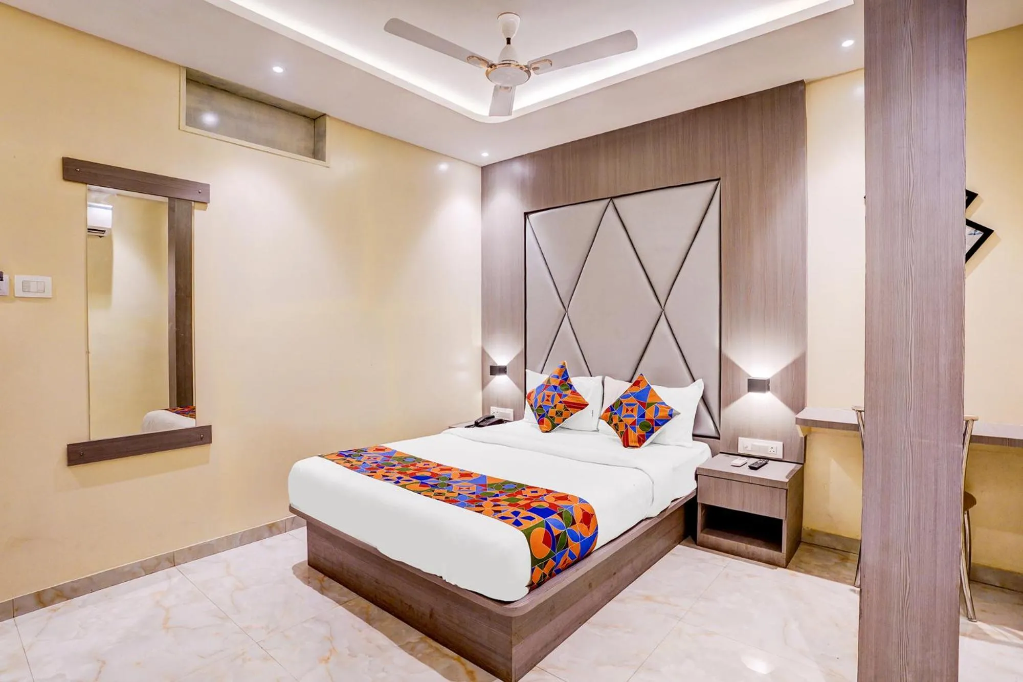 Bed in FabHotel Abrol Suites