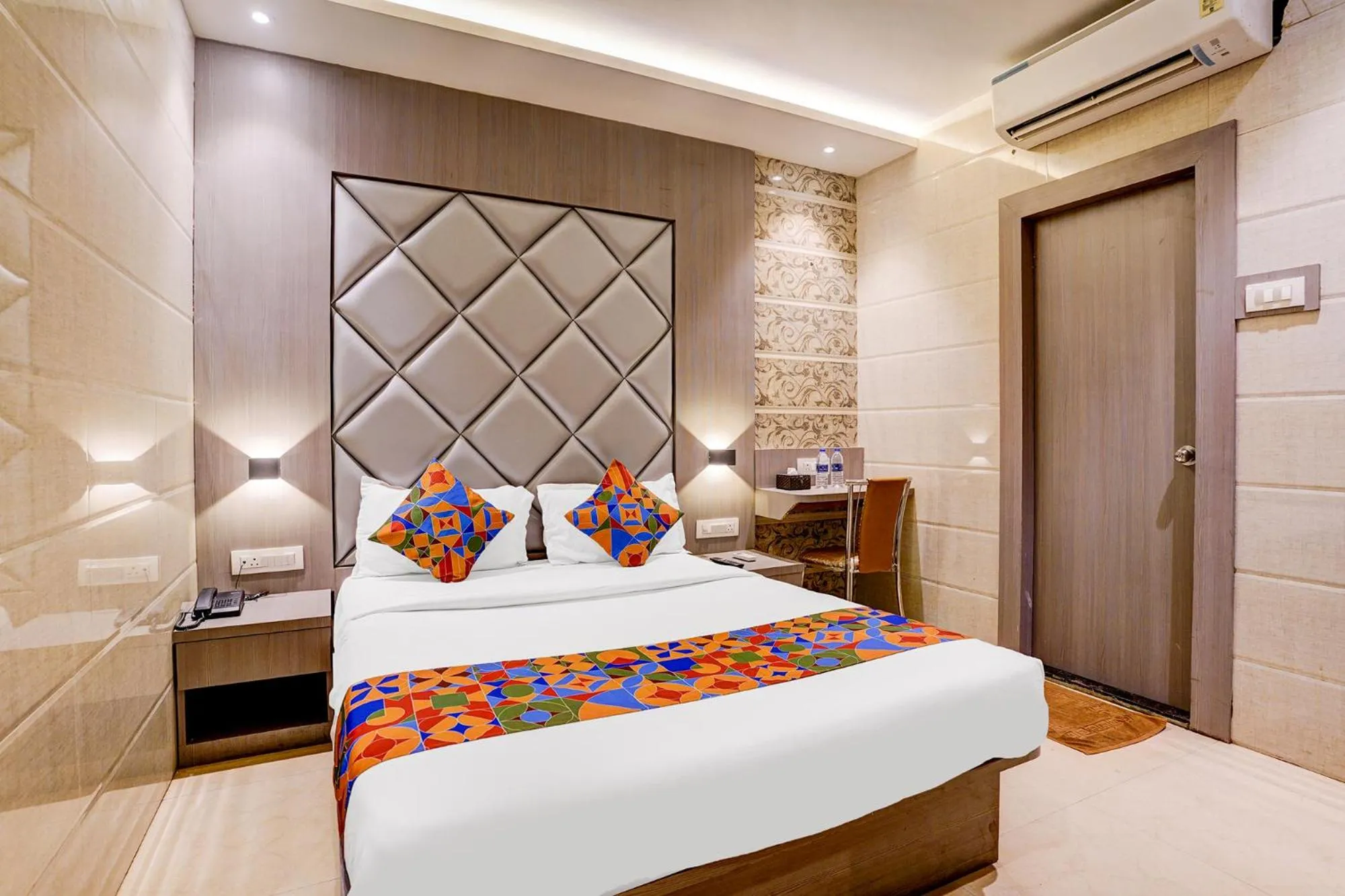 Bed in FabHotel Abrol Suites