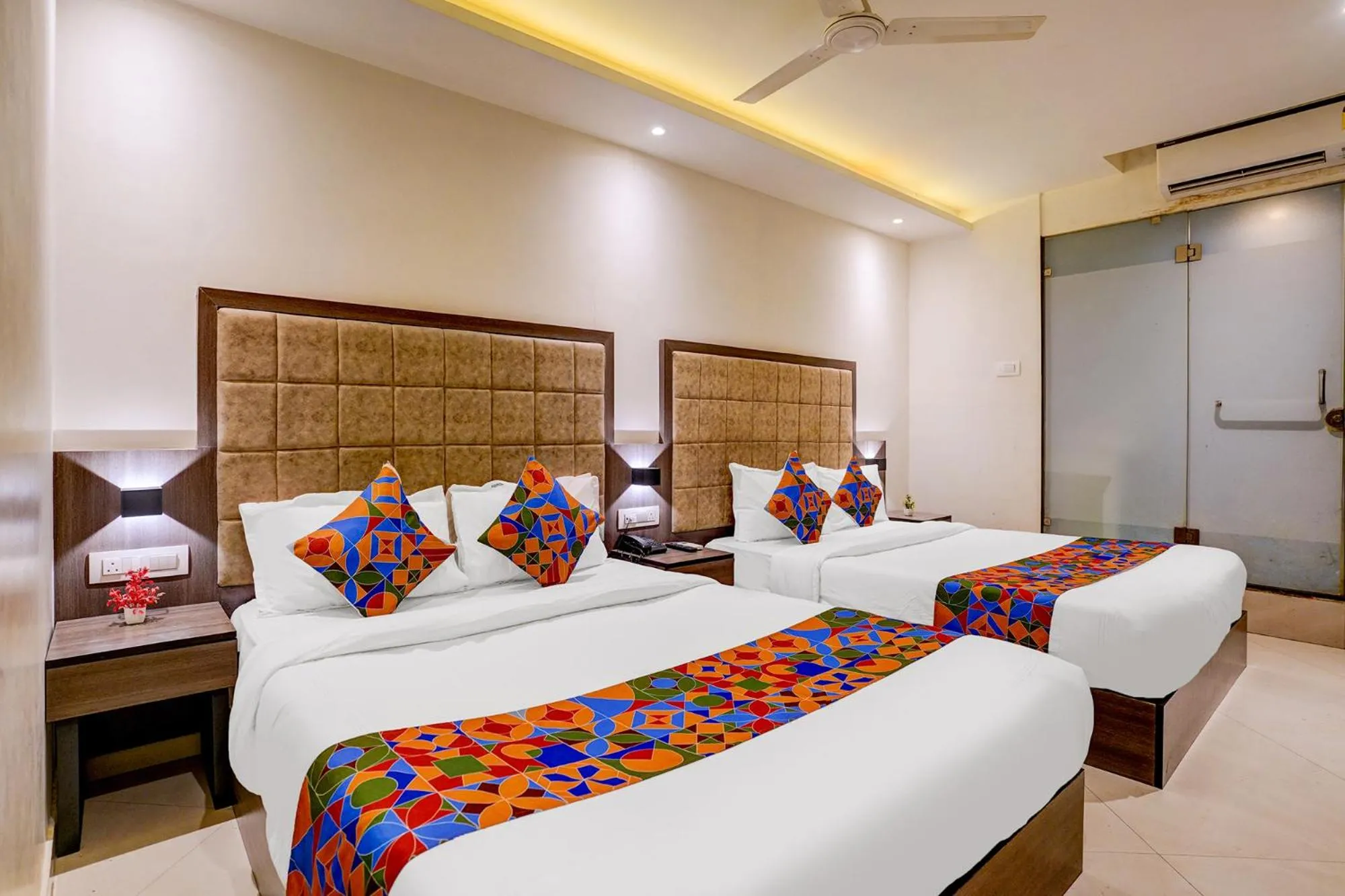 Bed in FabHotel Abrol Suites