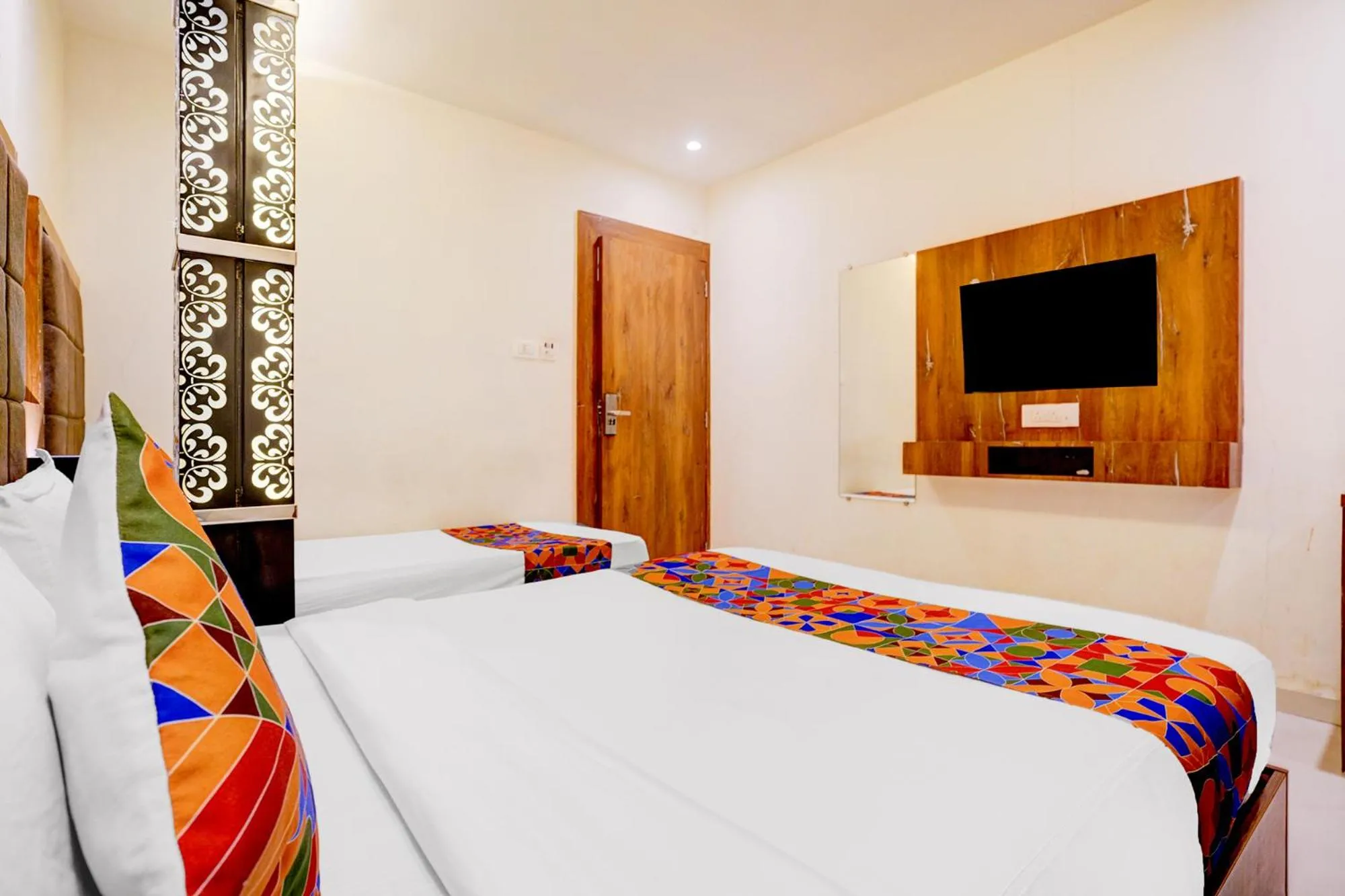 Bed in FabHotel Abrol Suites