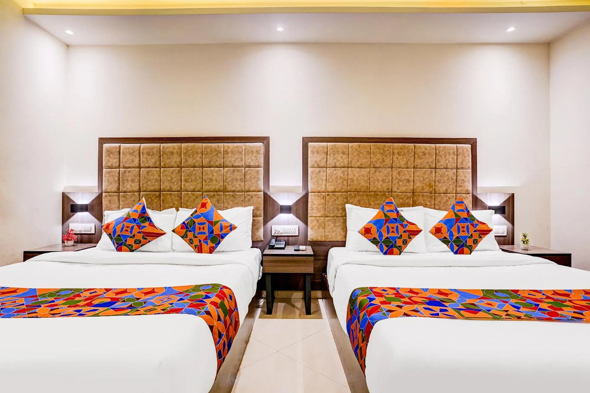 Bed in FabHotel Abrol Suites
