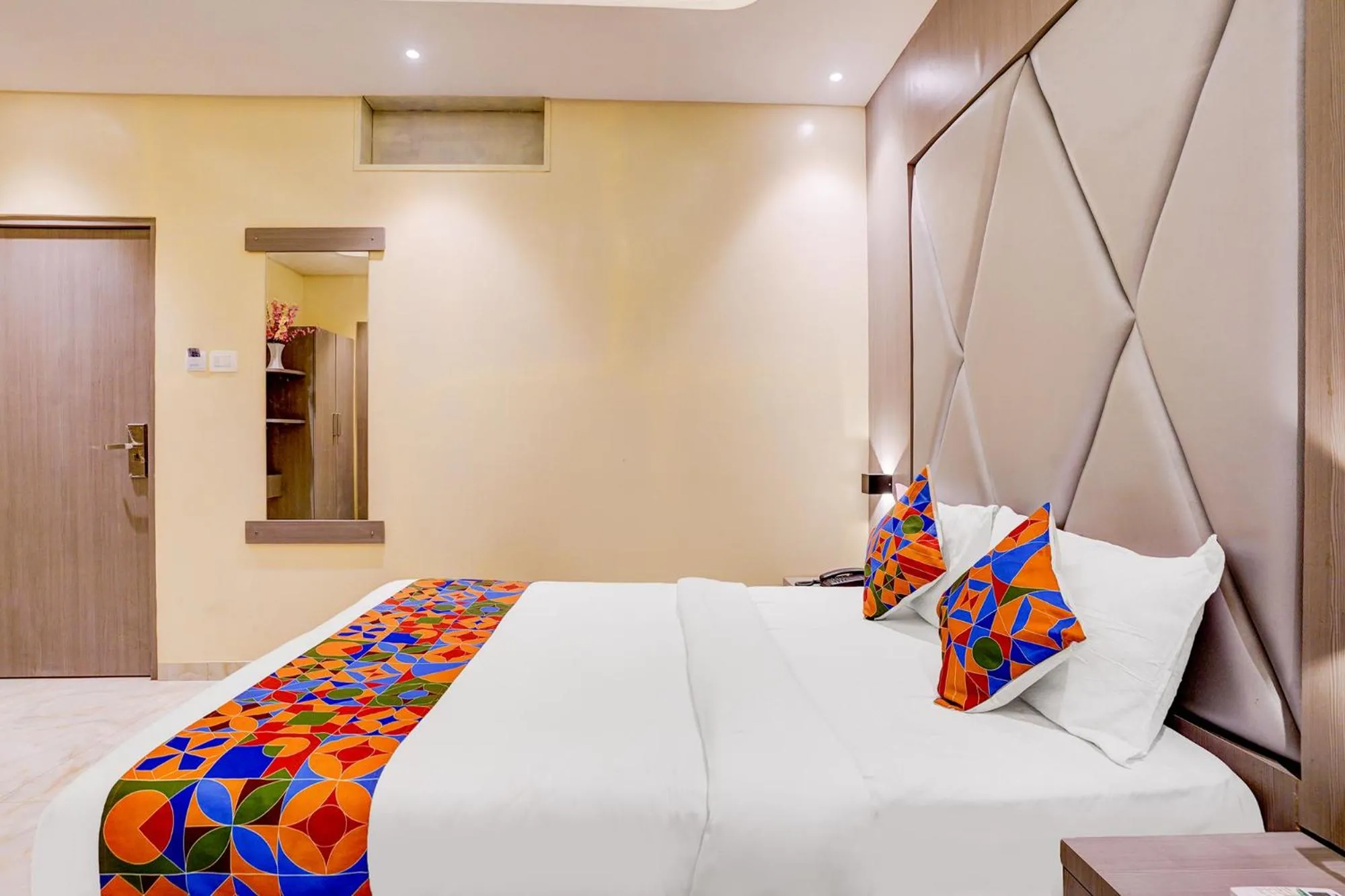 Bed in FabHotel Abrol Suites