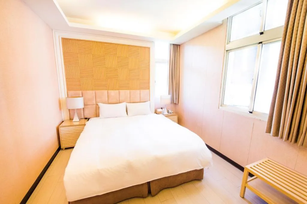 Bed in AOIKE Hot Spring Hotel