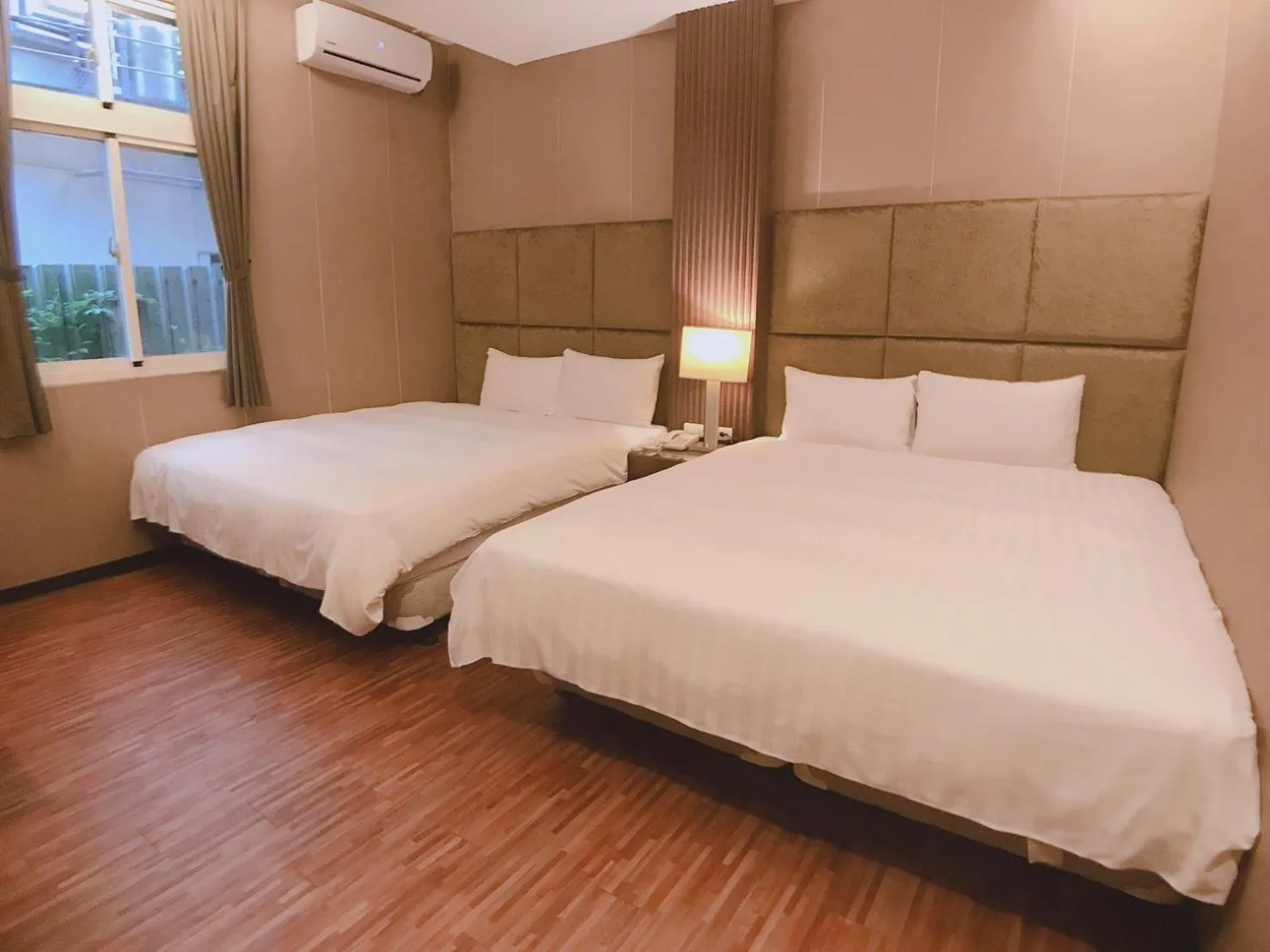 Bed in AOIKE Hot Spring Hotel