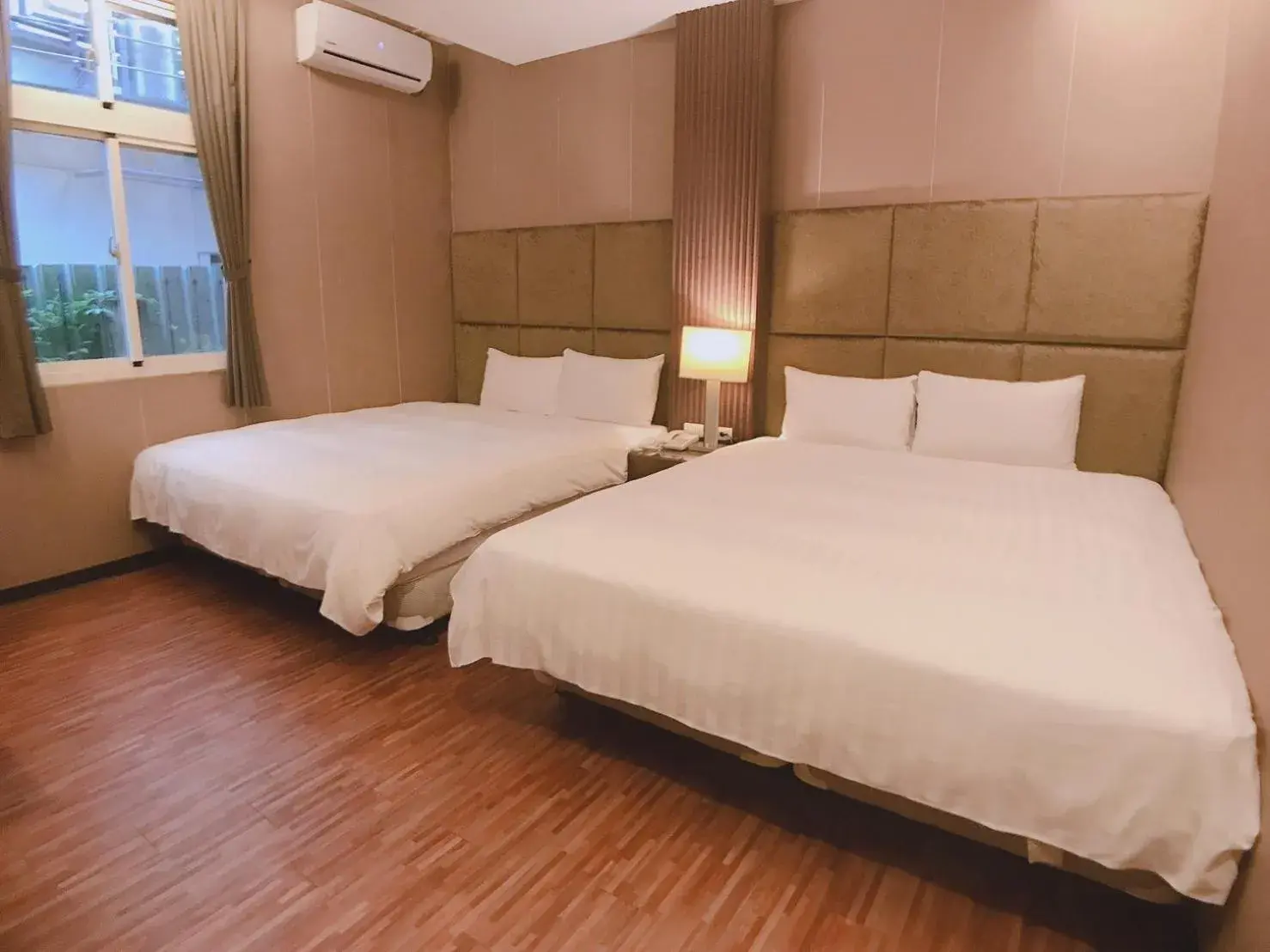 Bed in AOIKE Hot Spring Hotel Bed in AOIKE Hot Spring Hotel