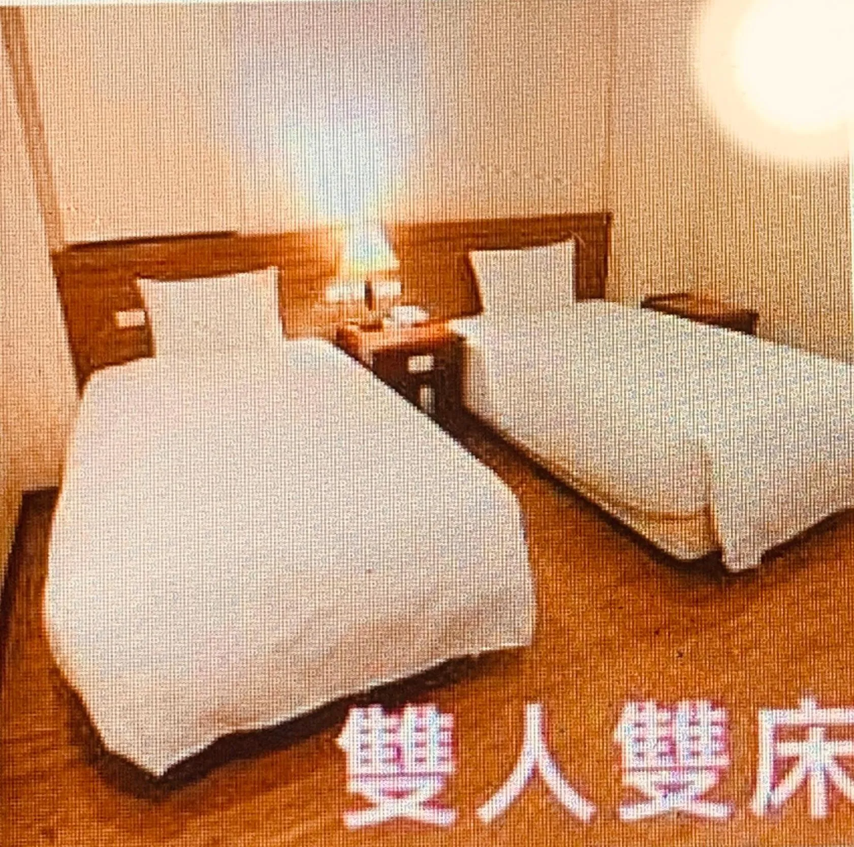 Bed in AOIKE Hot Spring Hotel
