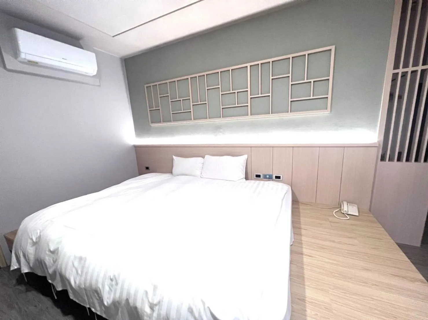 Bed in AOIKE Hot Spring Hotel