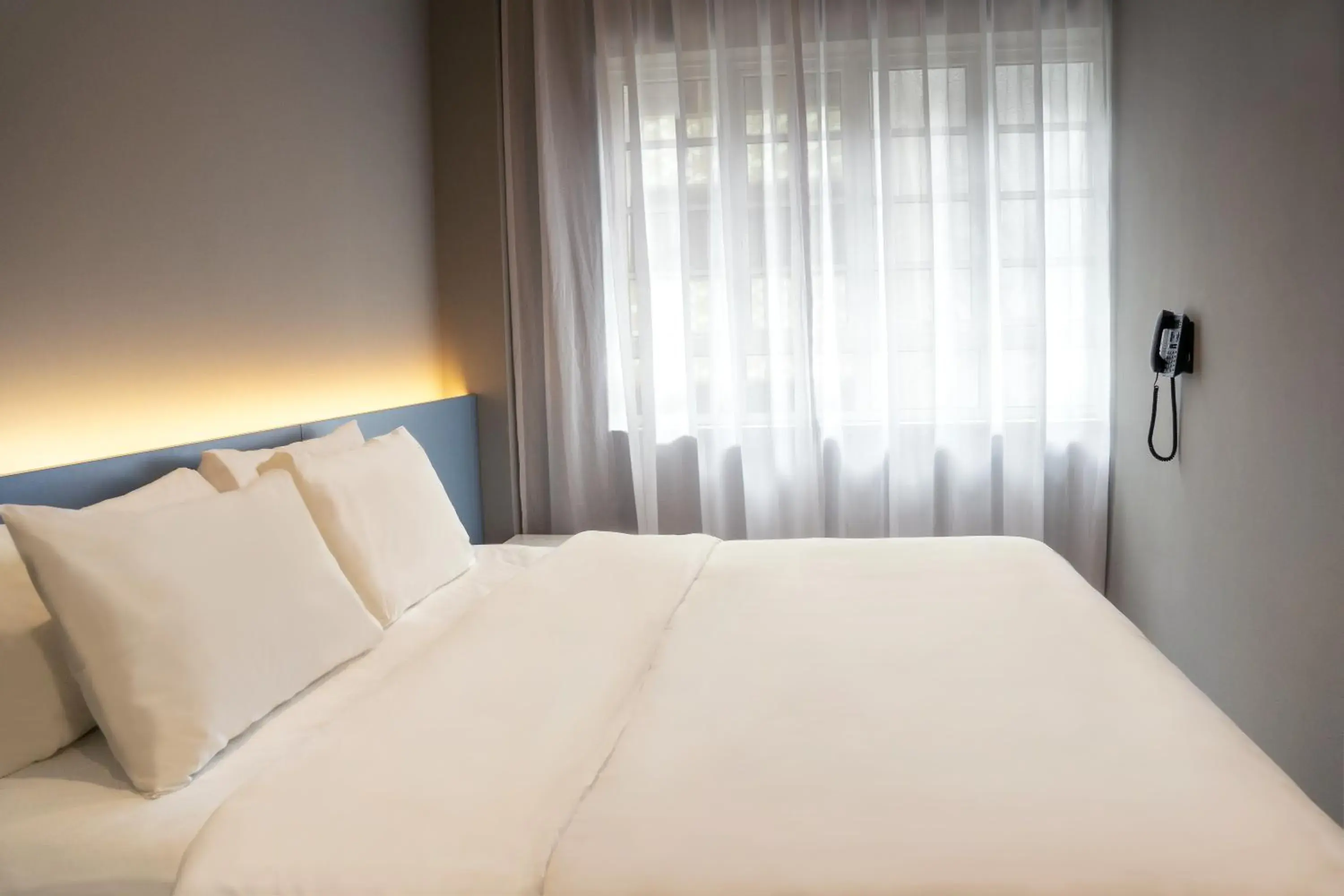 Bed in Hotel Bencoolen at Hong Kong Street Bed in Hotel Bencoolen at Hong Kong Street