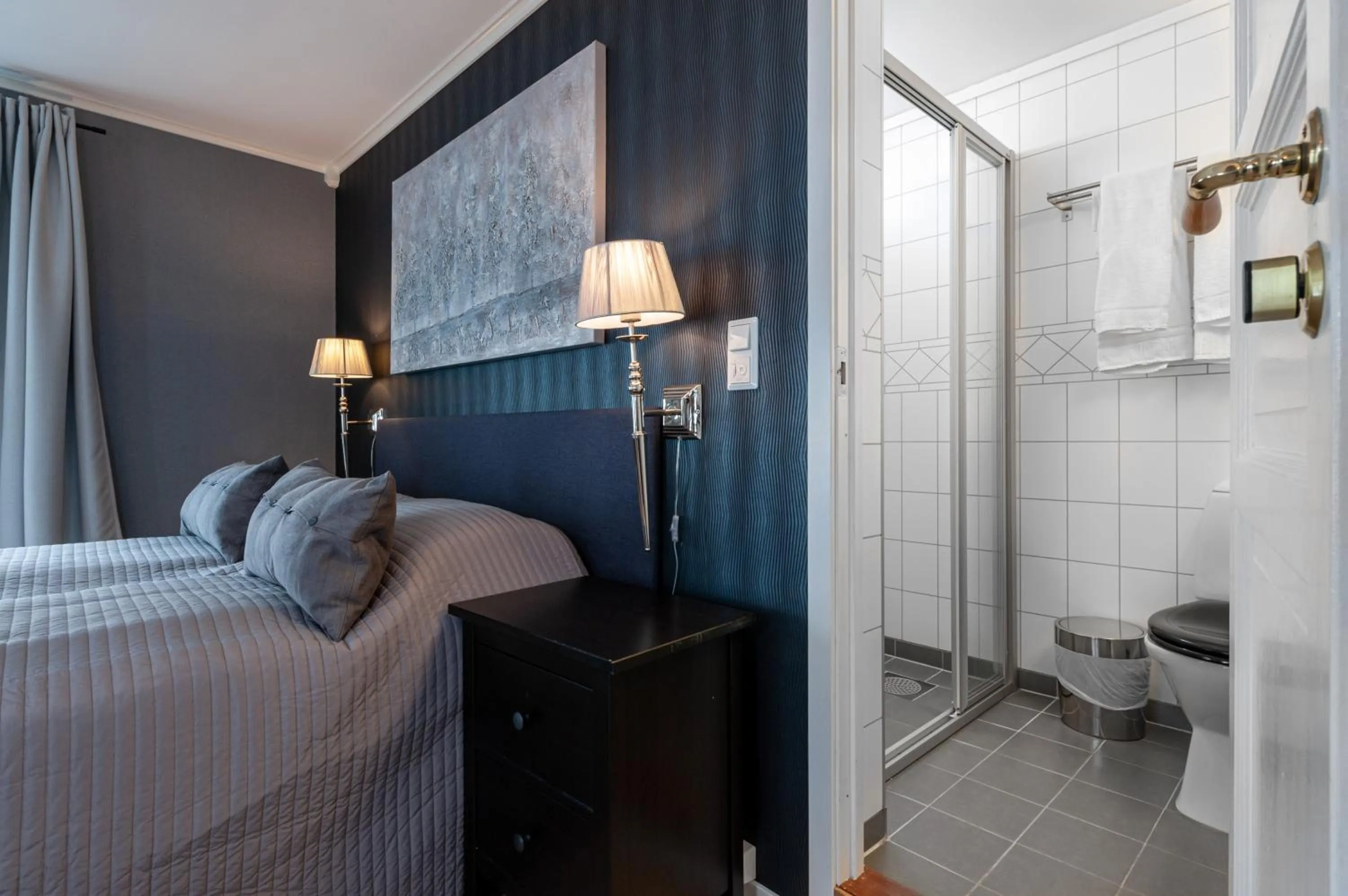 Bed in Kjøbmandsgaarden Hotel