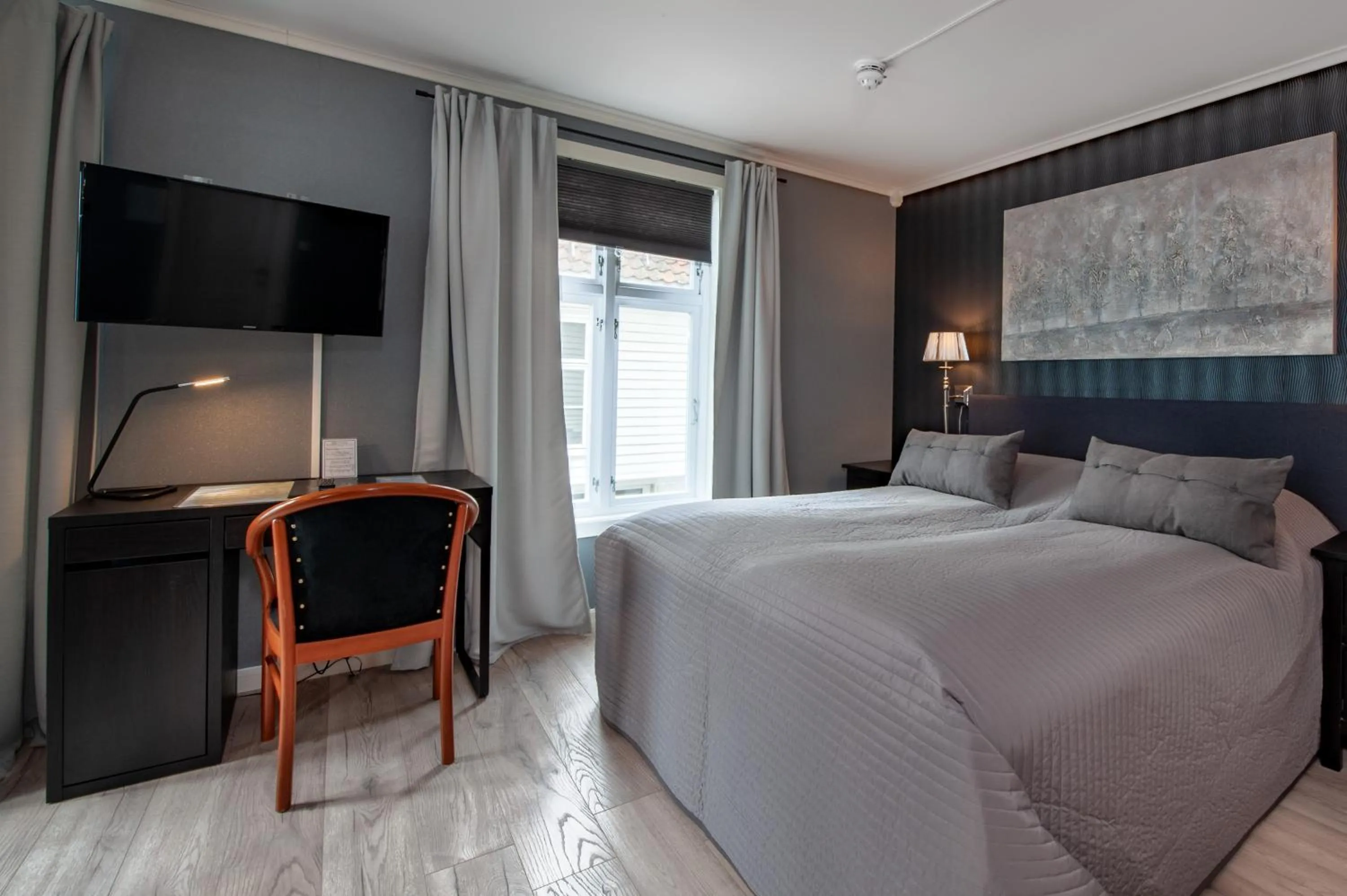 Bed in Kjøbmandsgaarden Hotel