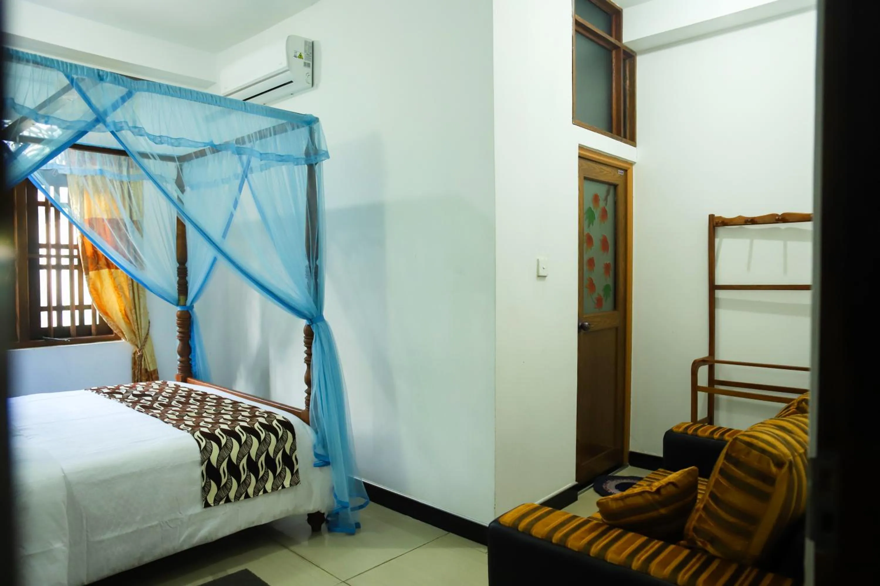 Seating area, Bed in Village Star Rest-Mirissa