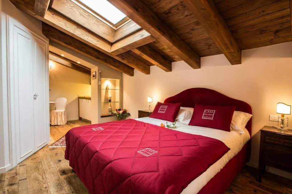 Bed in Casa Delneri Boutique Hotel Adults Only