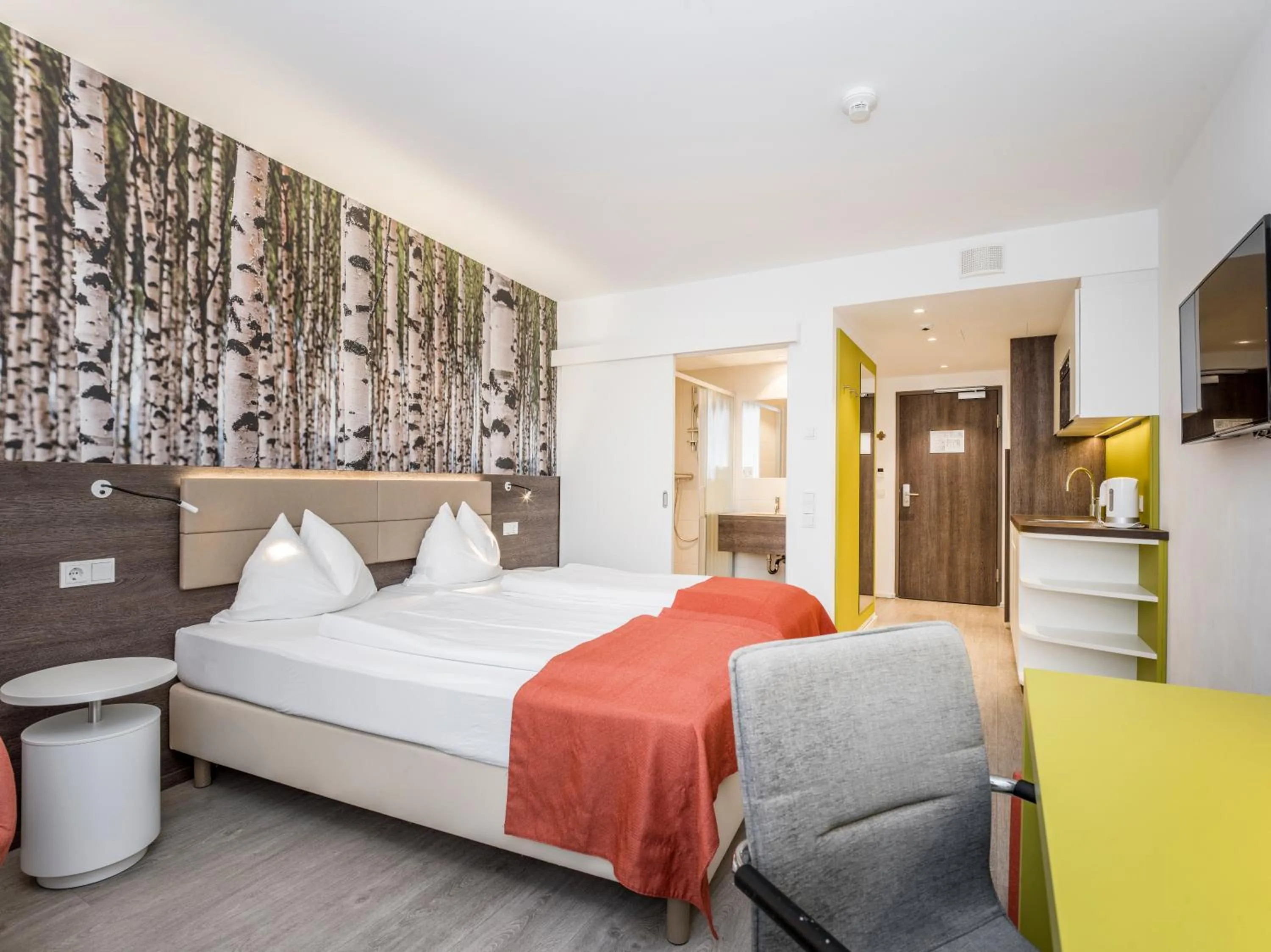 Bed in Eco Suite Hotel