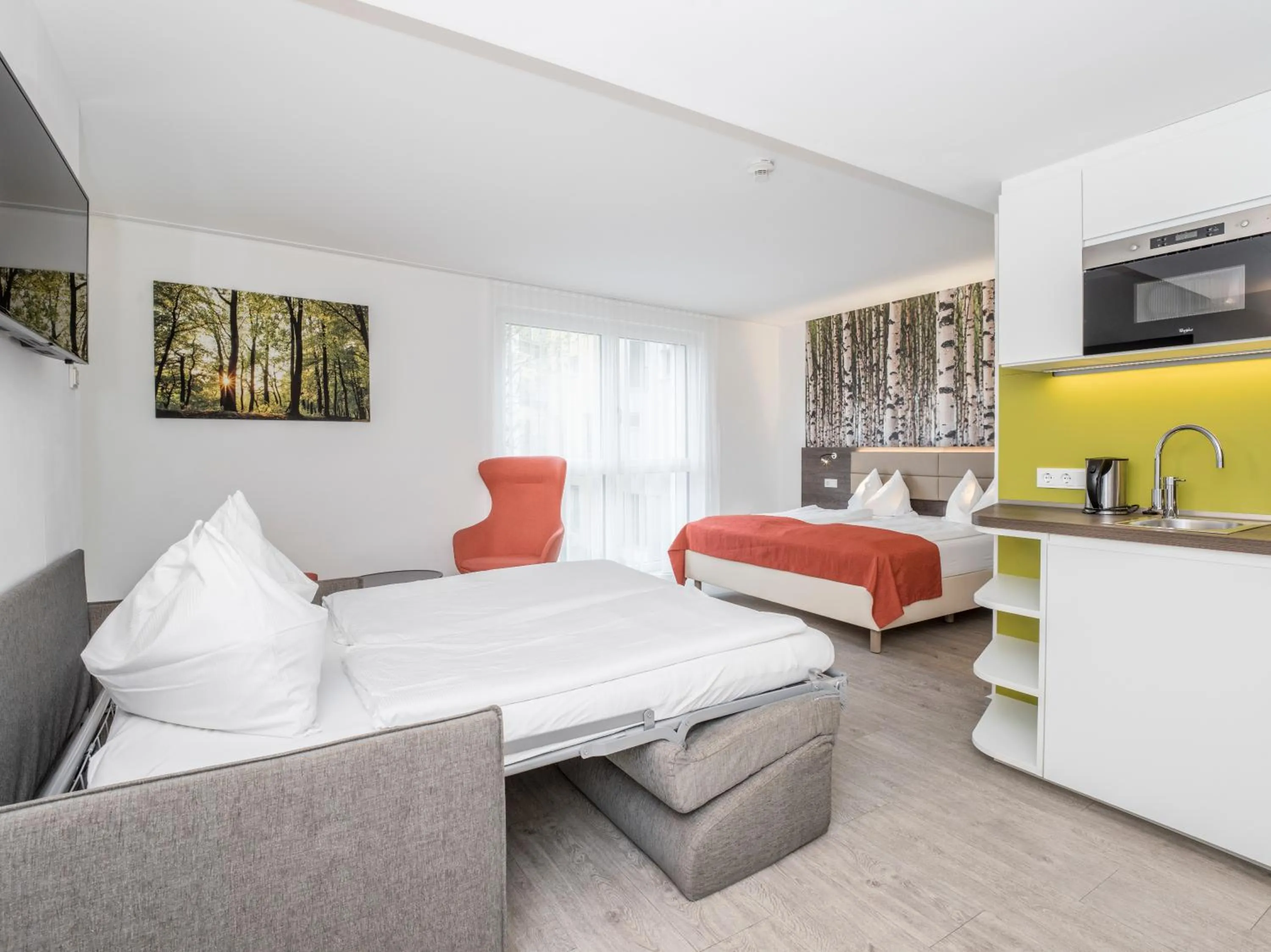 Bed in Eco Suite Hotel