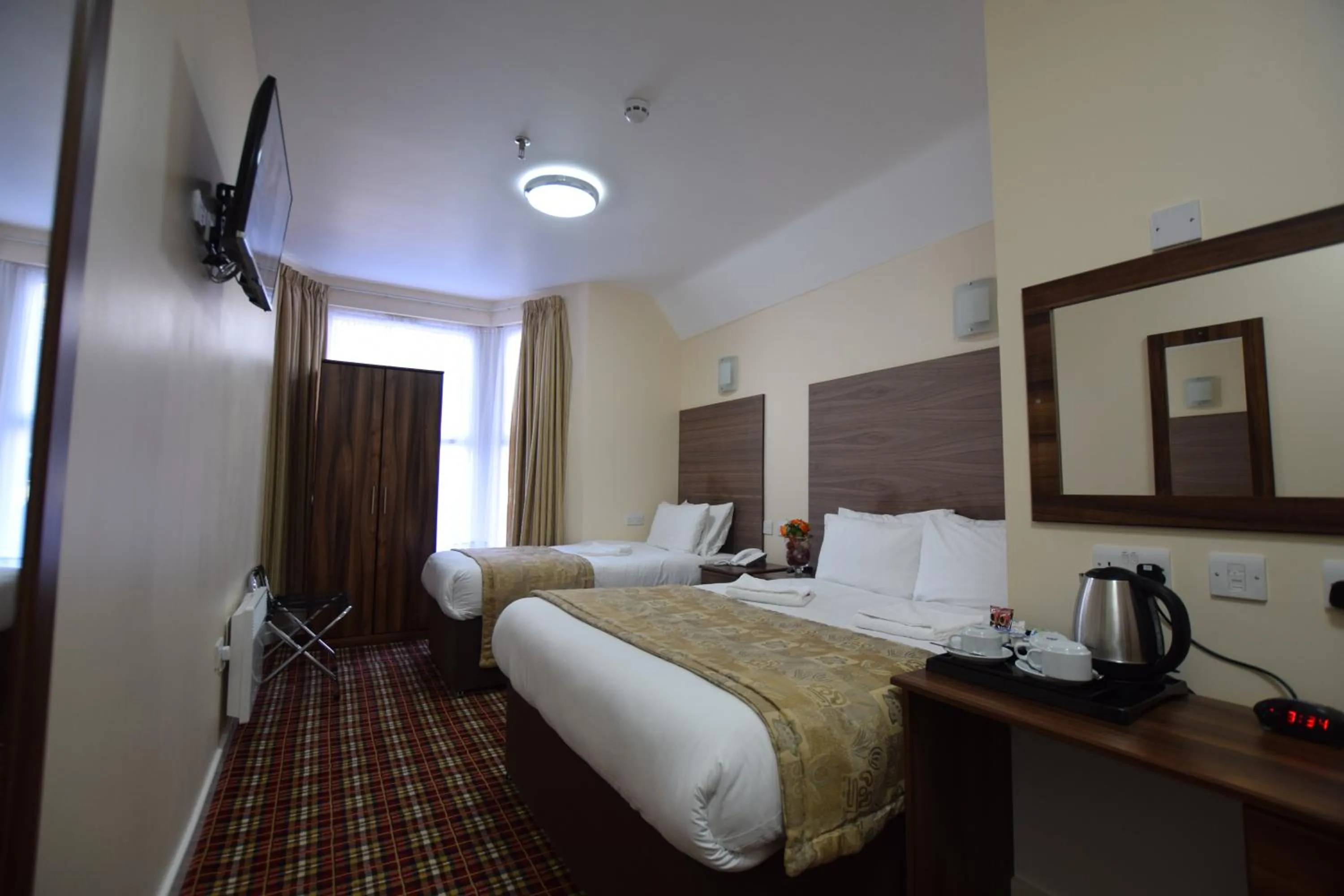 Photo of the whole room, Bed in Lucky 8 Hotel