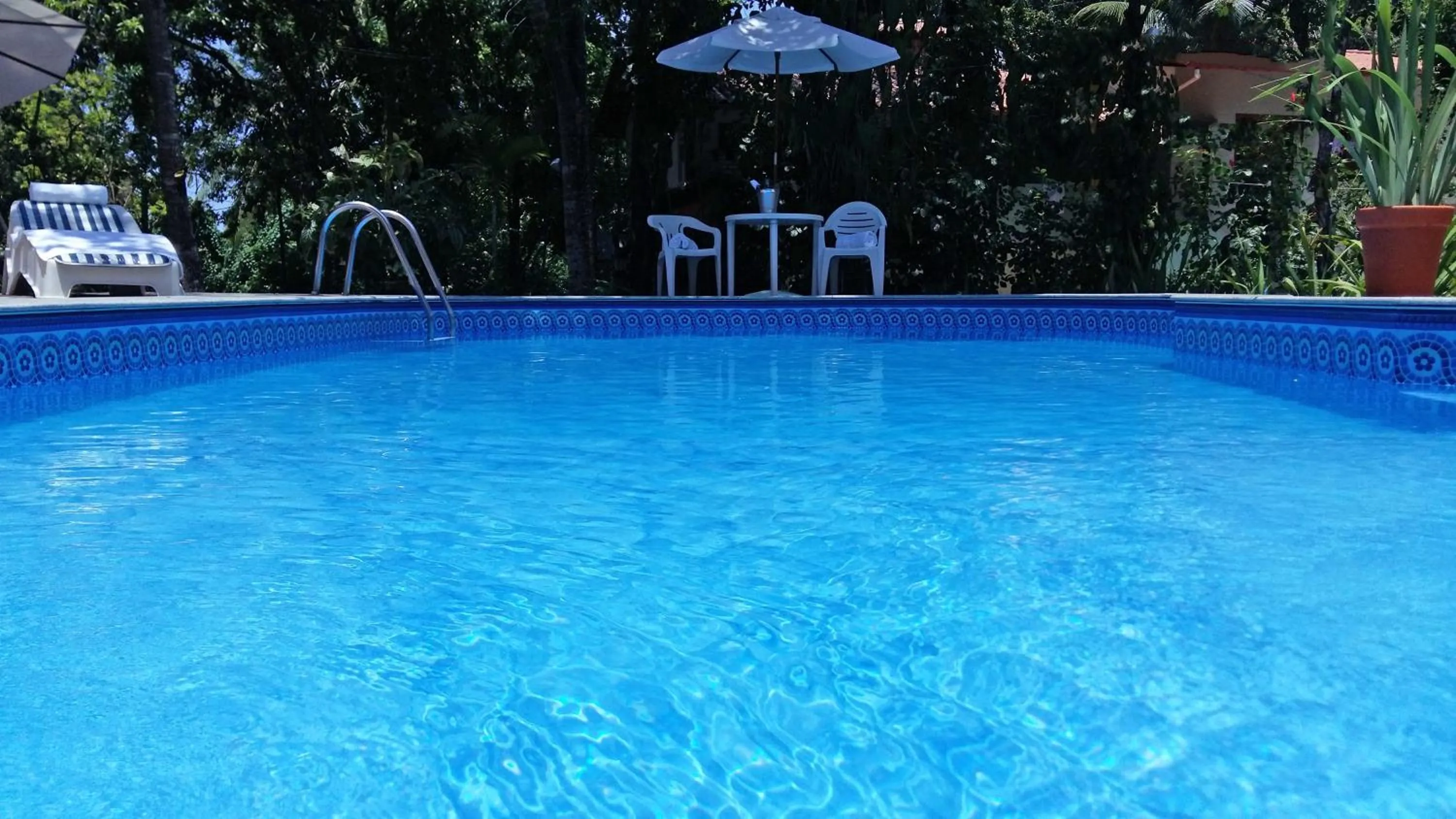 Swimming pool in Pousada Recanto da Terra