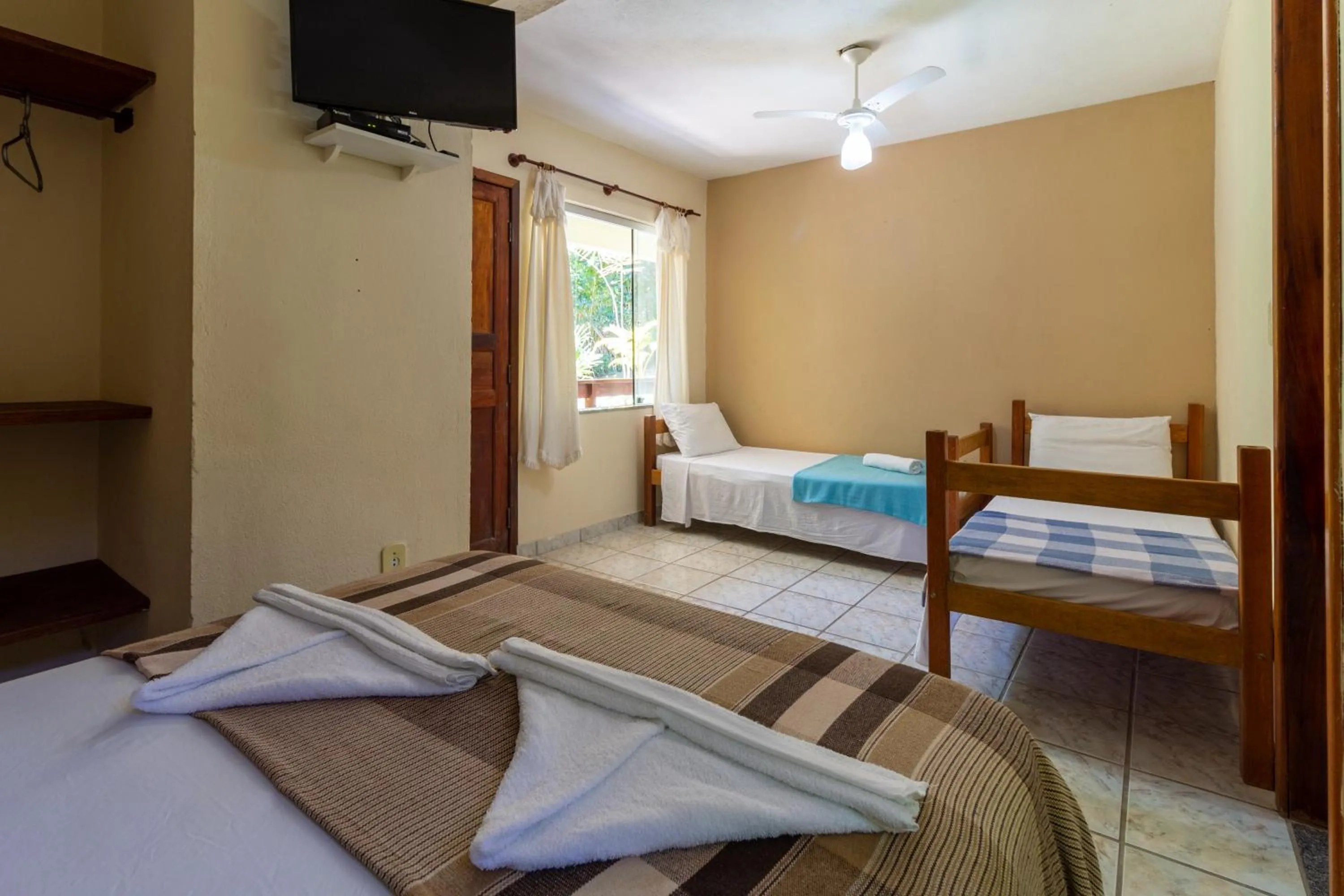 Bed in Pousada Recanto da Terra