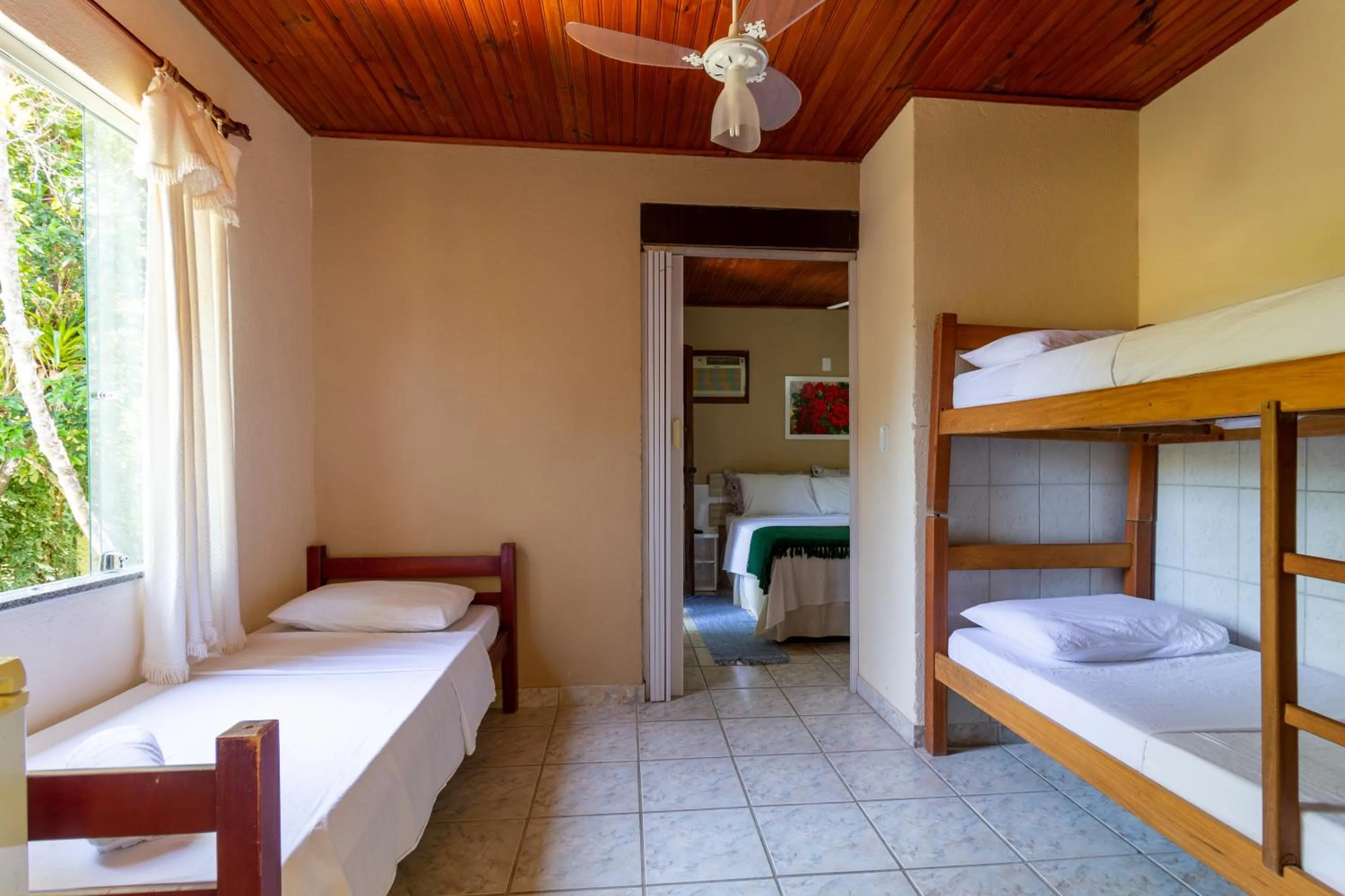 Bed in Pousada Recanto da Terra