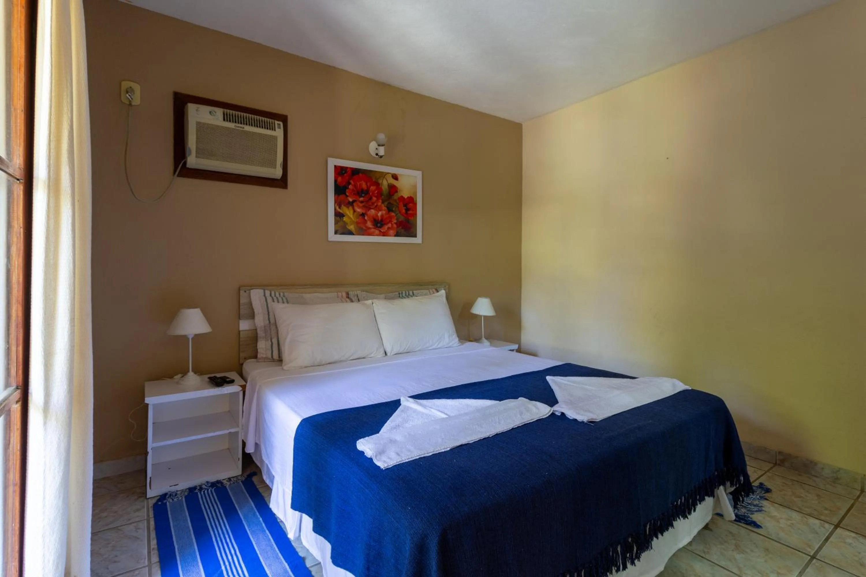 Bed in Pousada Recanto da Terra