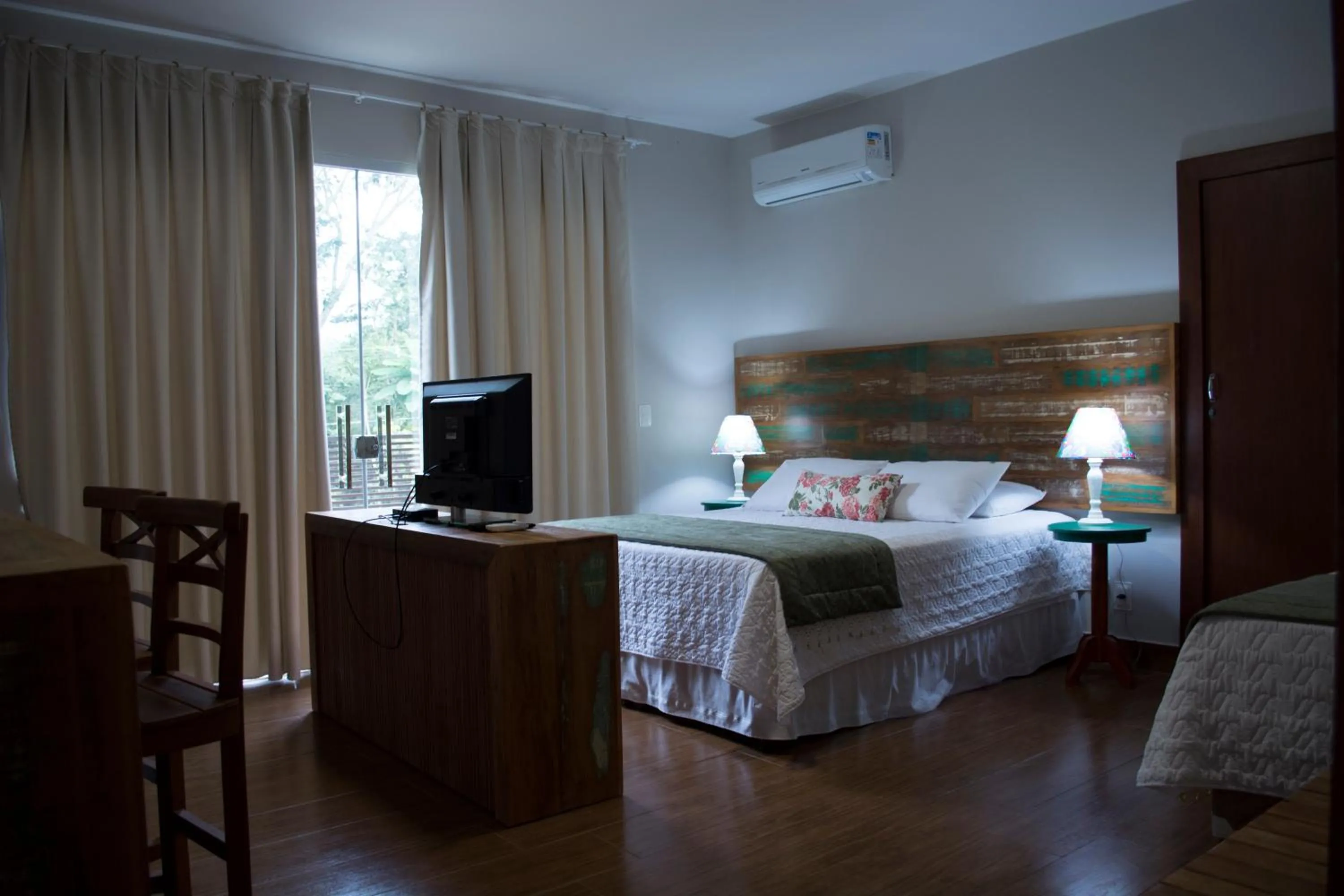 Bed in Pousada Recanto das Araras