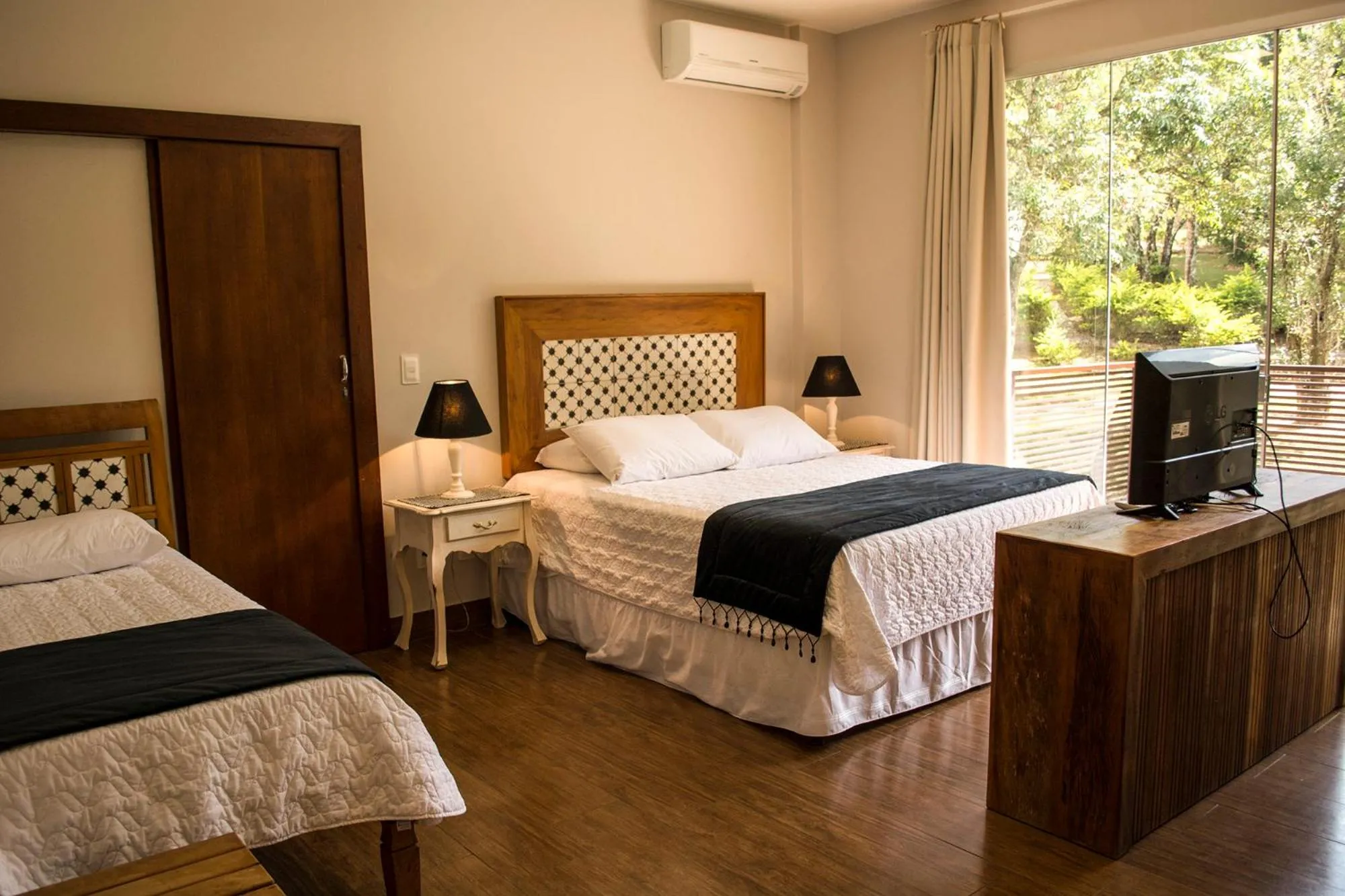 Bed in Pousada Recanto das Araras