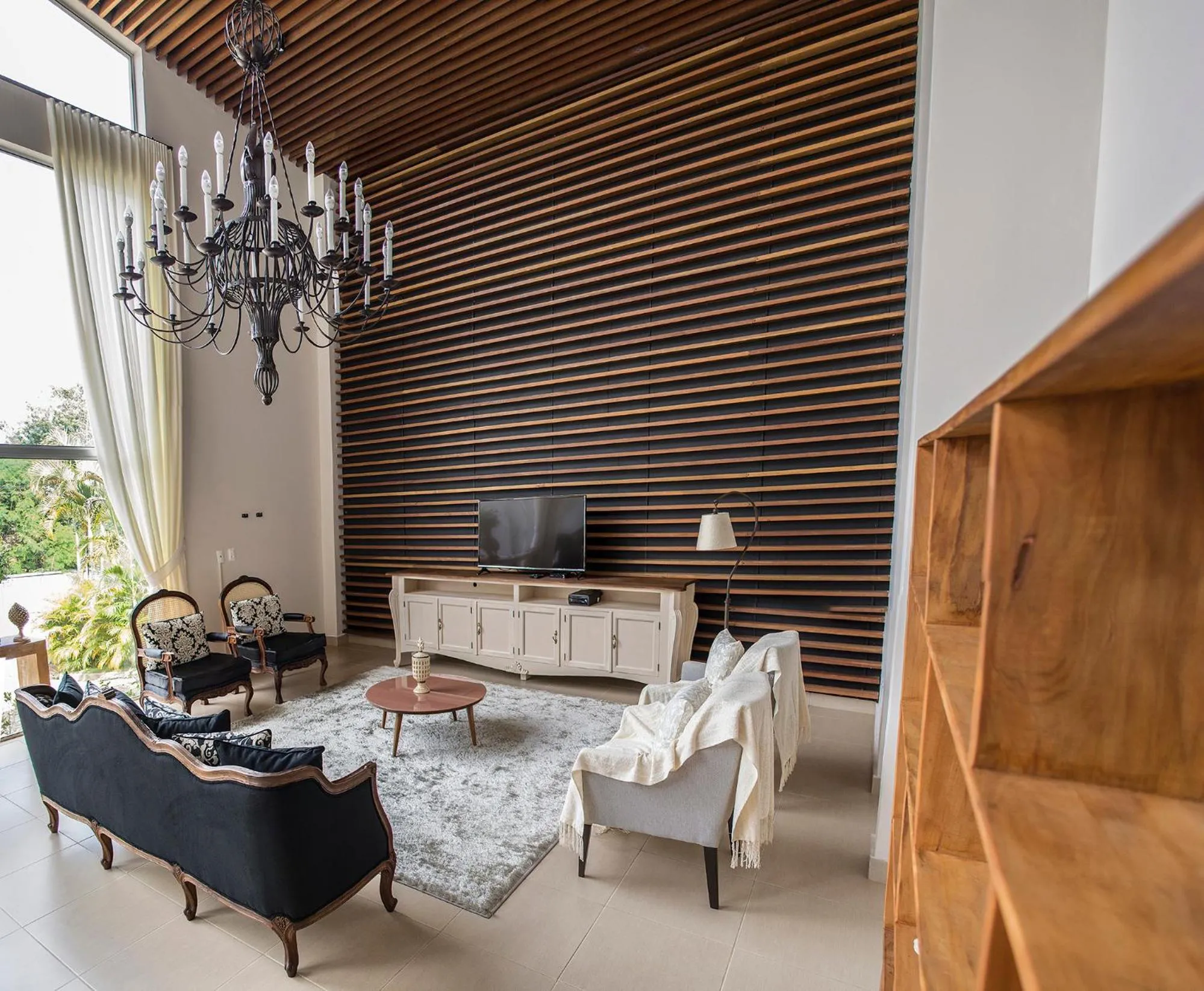 Communal lounge/ TV room in Pousada Recanto das Araras