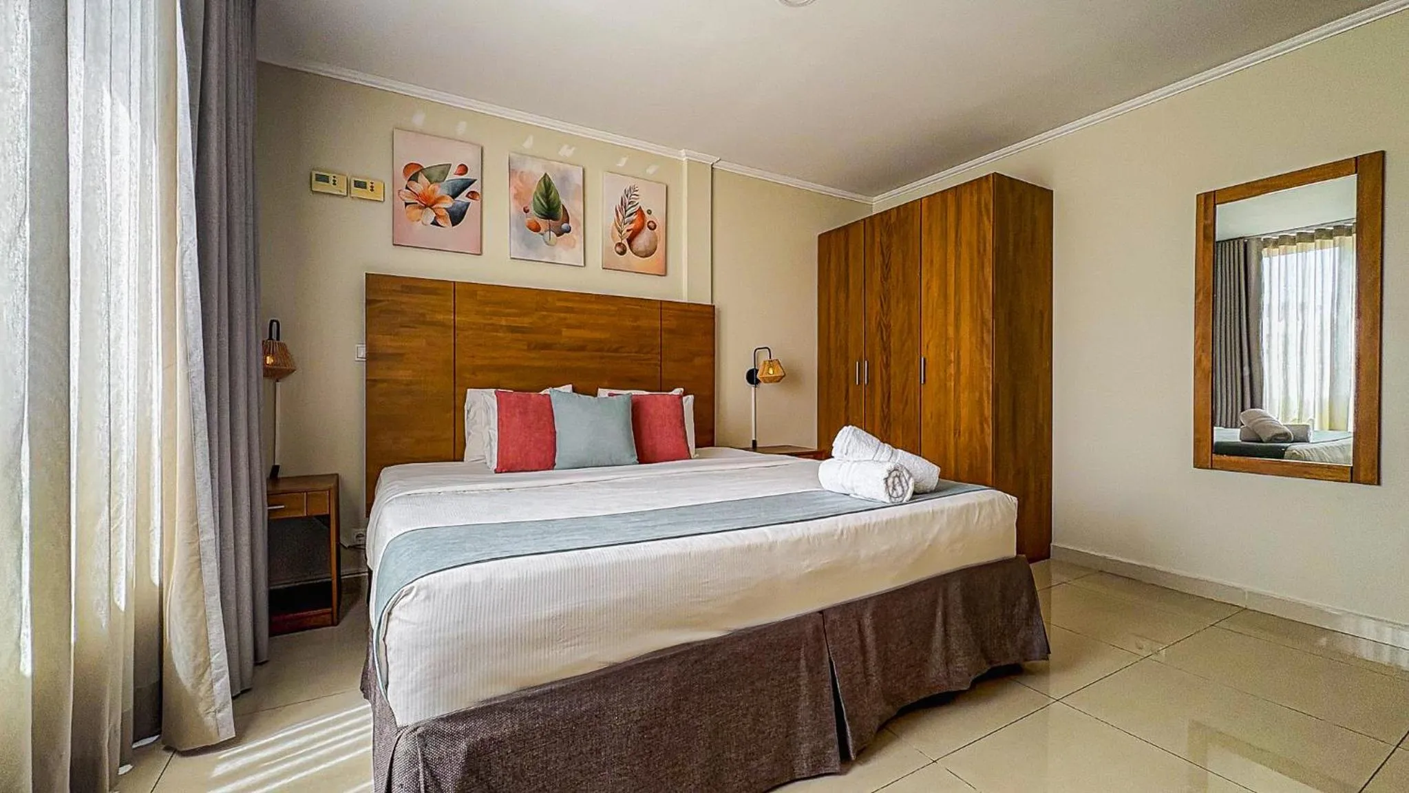 Bed in Majestic City Suites & Beach Hotel