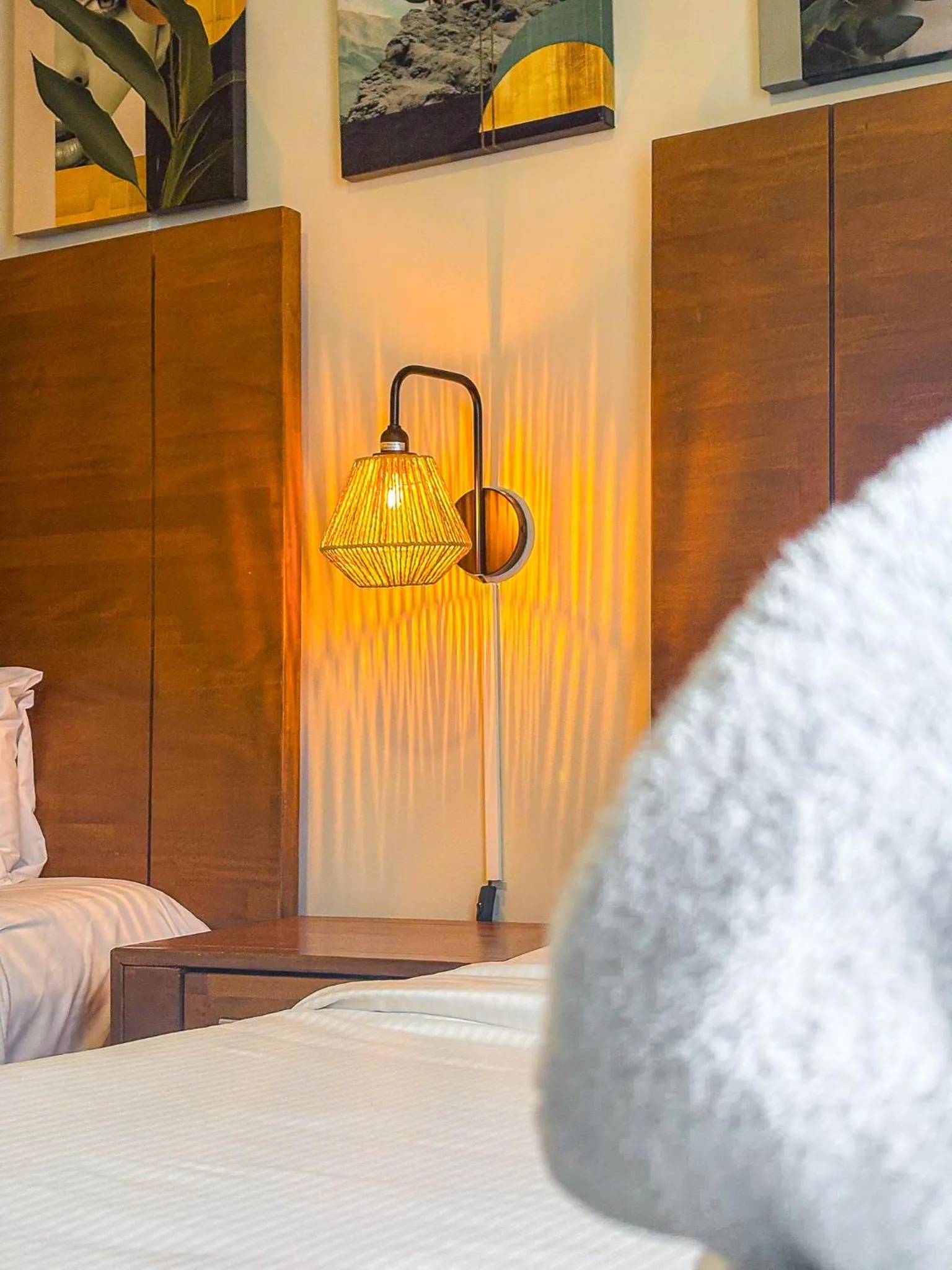 Bed in Majestic City Suites & Beach Hotel