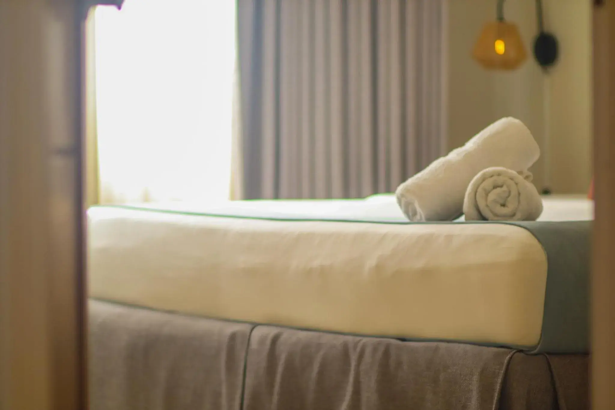 Bed in Majestic City Suites & Beach Hotel Bed in Majestic City Suites & Beach Hotel