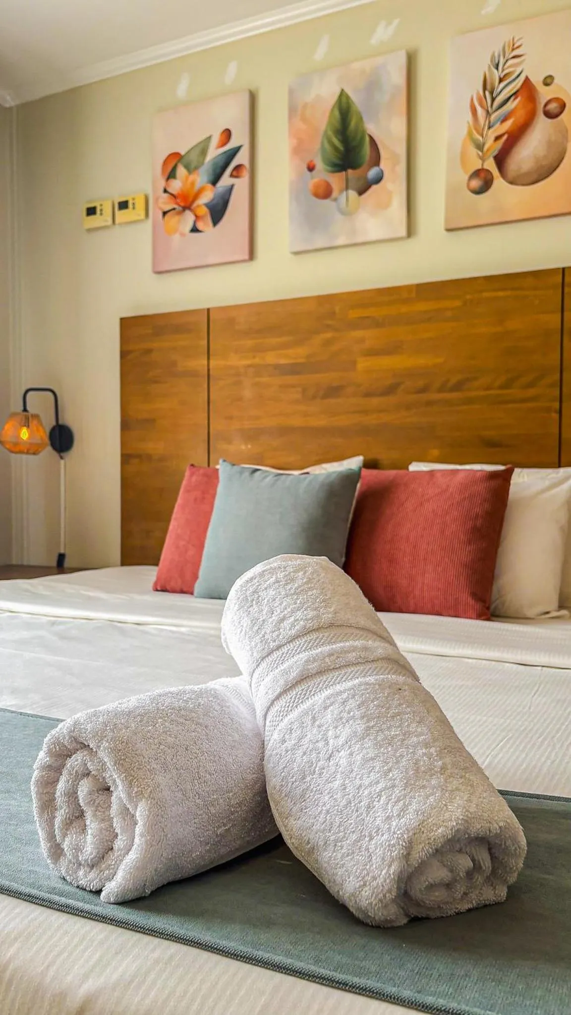 Bed in Majestic City Suites & Beach Hotel