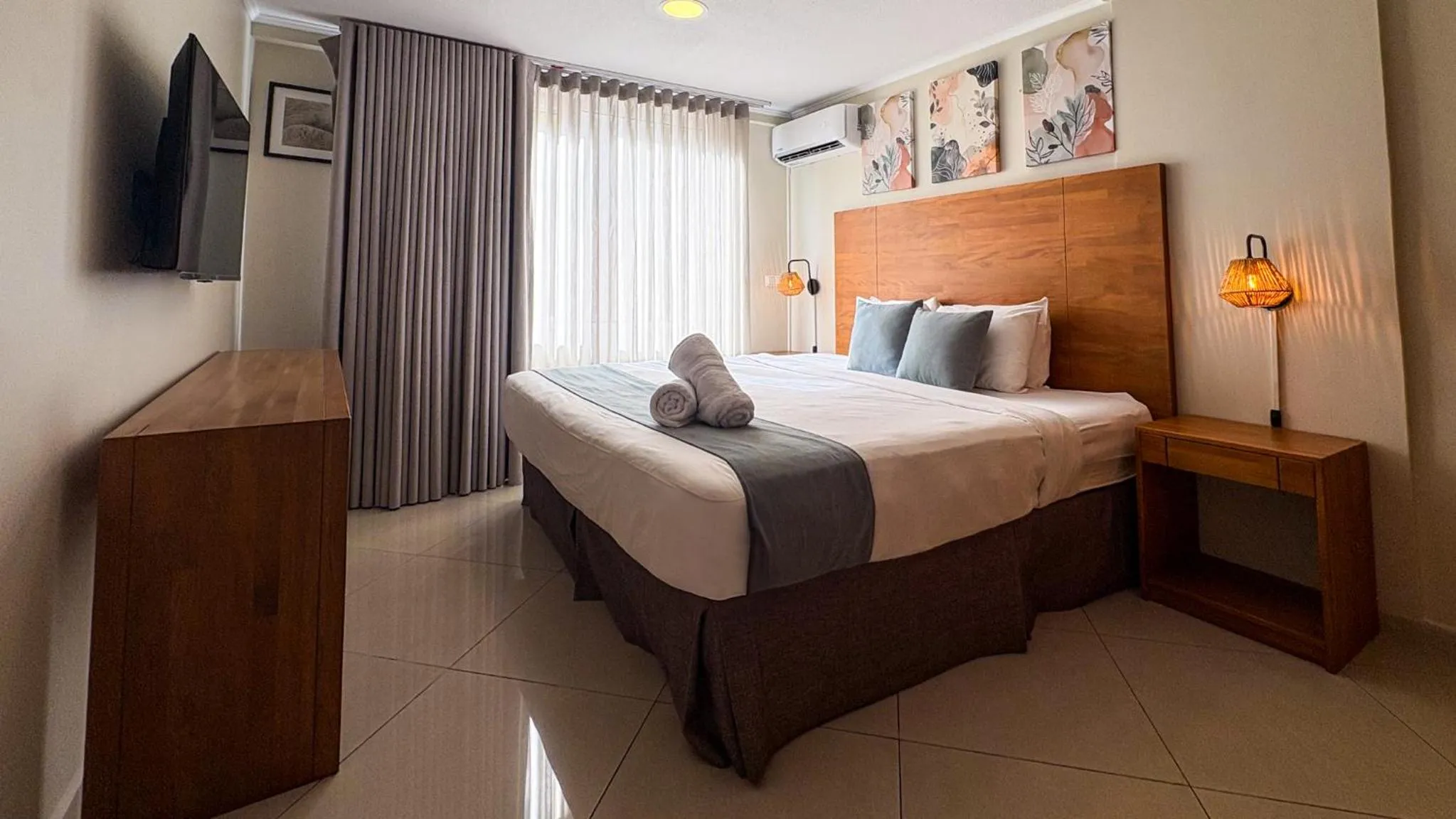 Photo of the whole room, Bed in Majestic City Suites & Beach Hotel