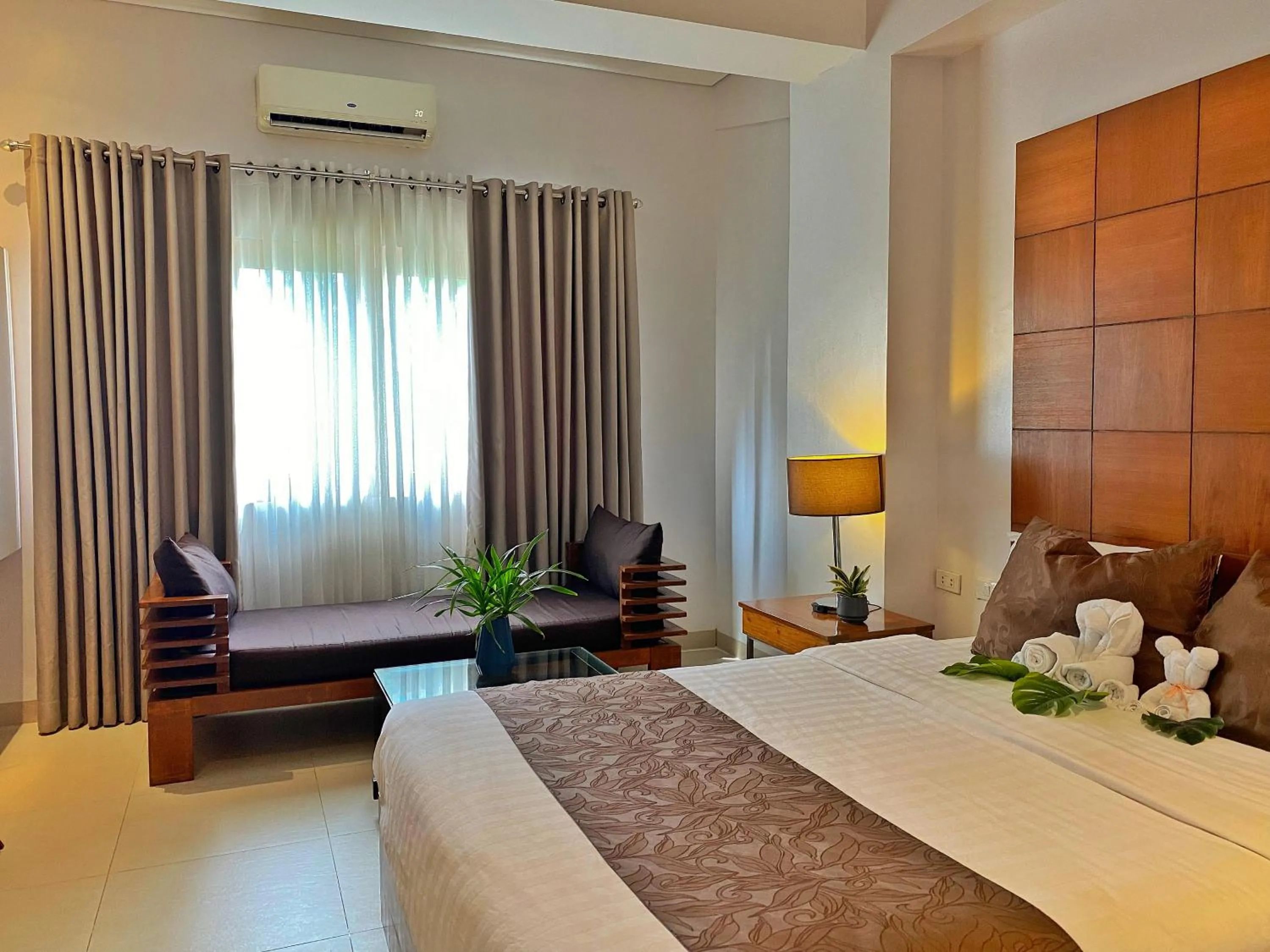 Bed in Aloha Boracay Hotel