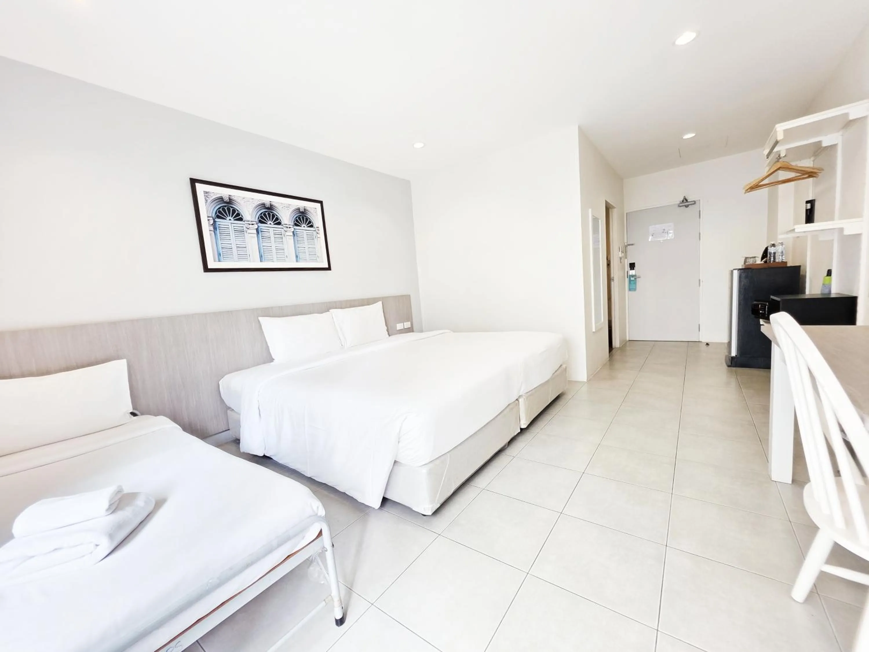 Bed in Recenta Phuket Suanluang by Deevana