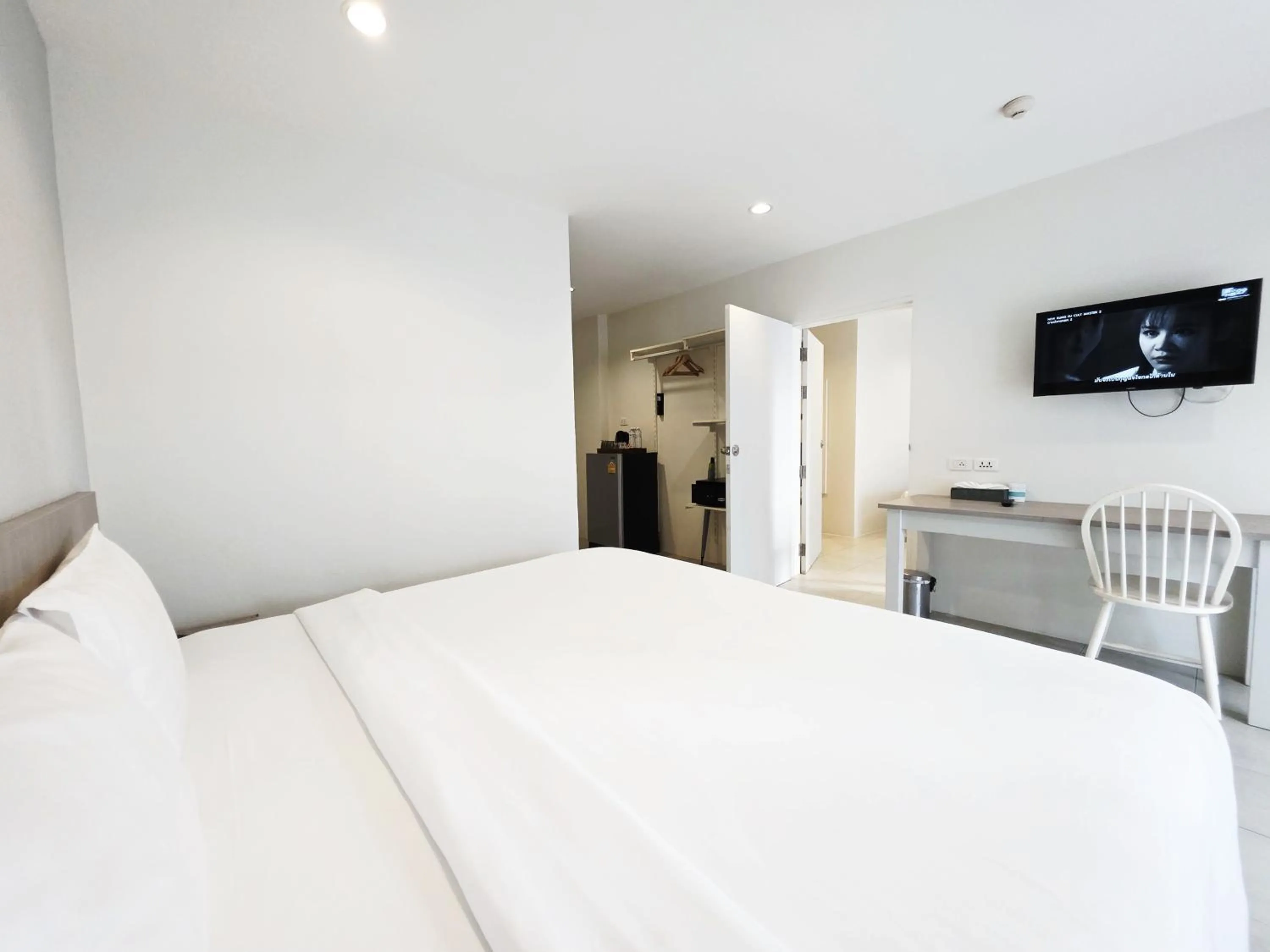 Bed in Recenta Phuket Suanluang by Deevana