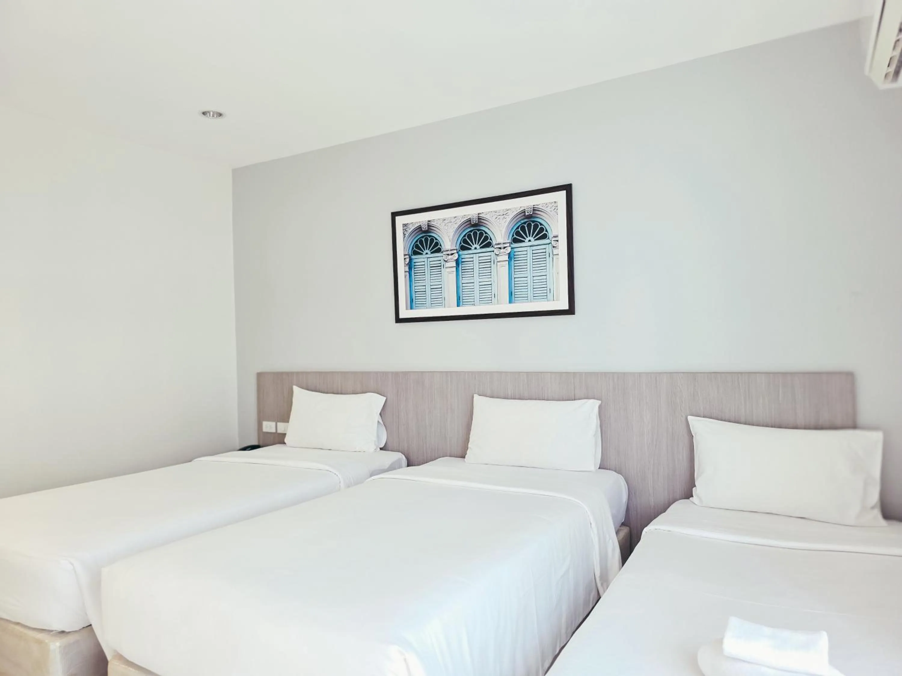 Bed in Recenta Phuket Suanluang by Deevana