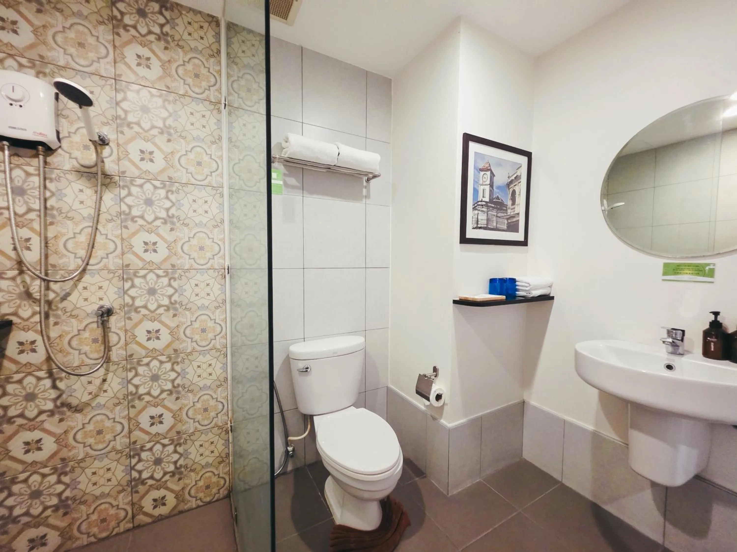 Shower in Recenta Phuket Suanluang by Deevana