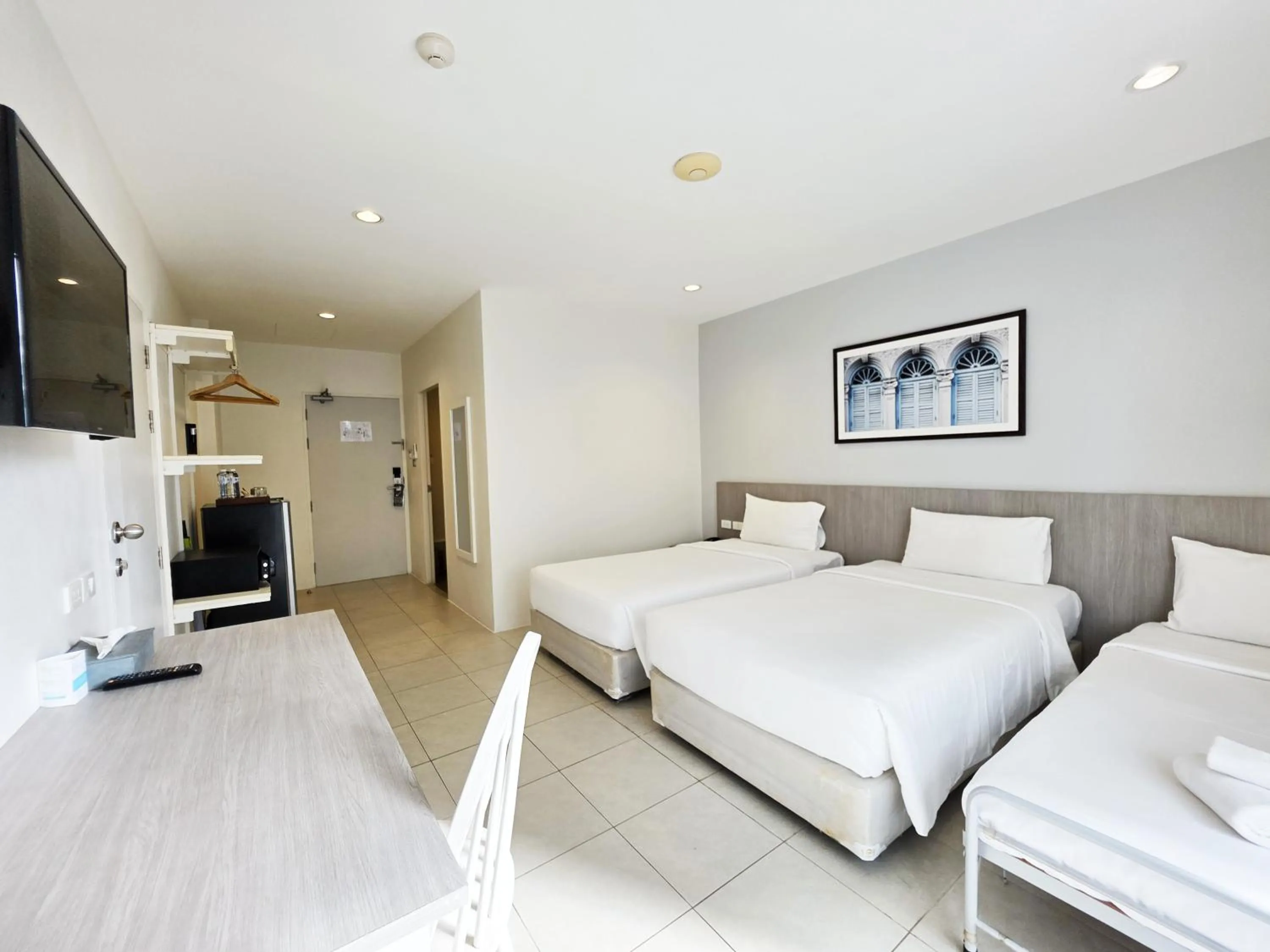 Bed in Recenta Phuket Suanluang by Deevana