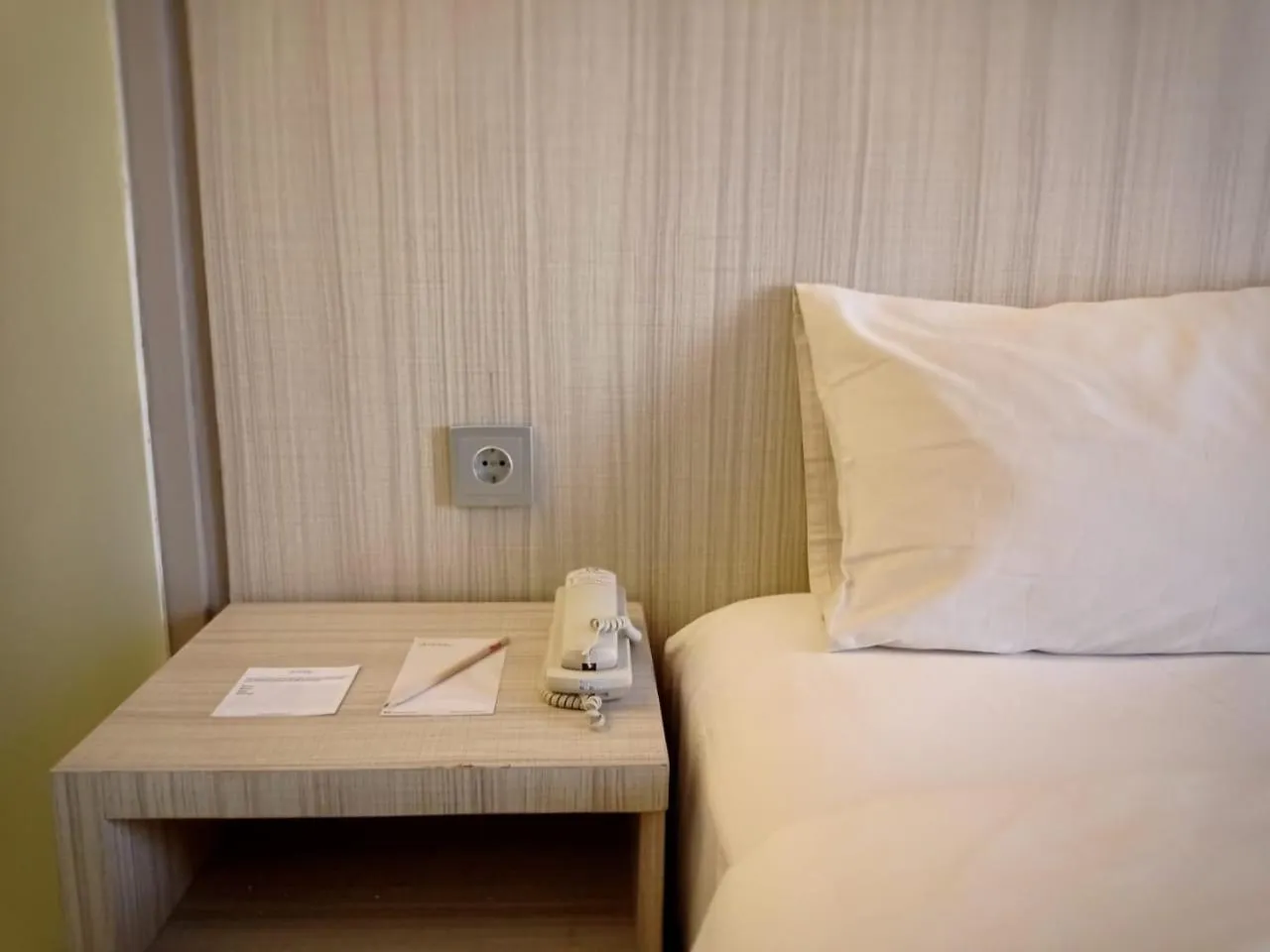 Bed in Grand Kolopaking Hotel