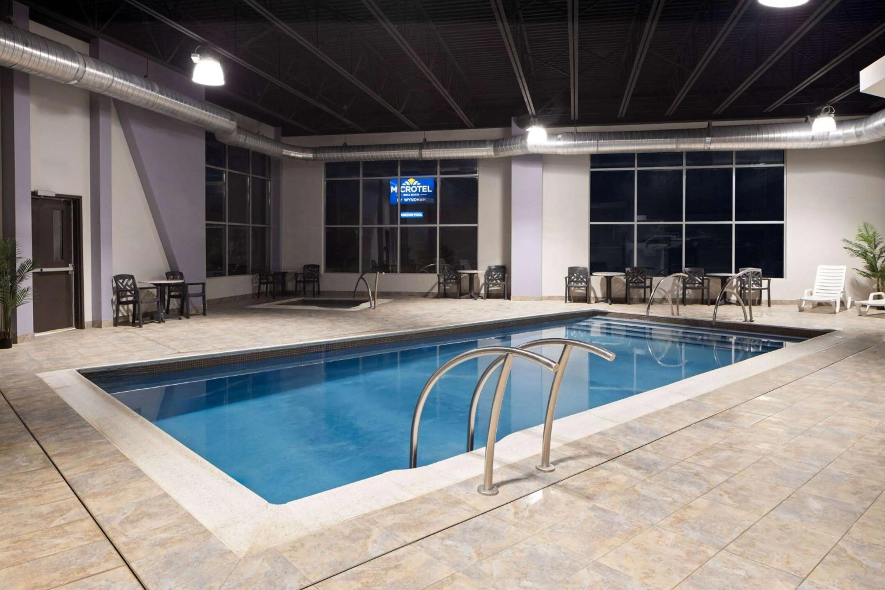 Swimming pool in Microtel Inn & Suites by Wyndham Kirkland Lake
