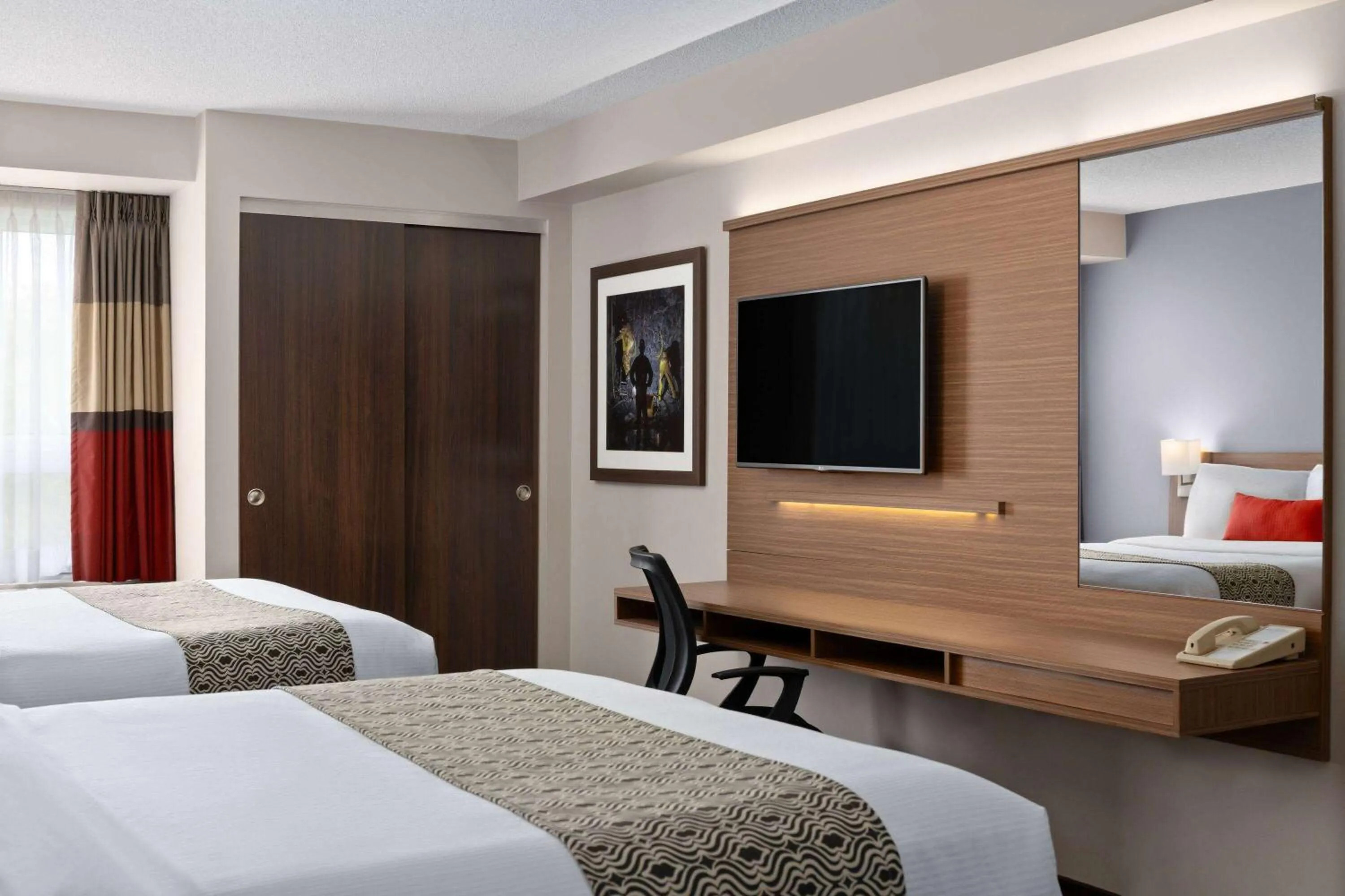 Photo of the whole room, Bed in Microtel Inn & Suites by Wyndham Kirkland Lake