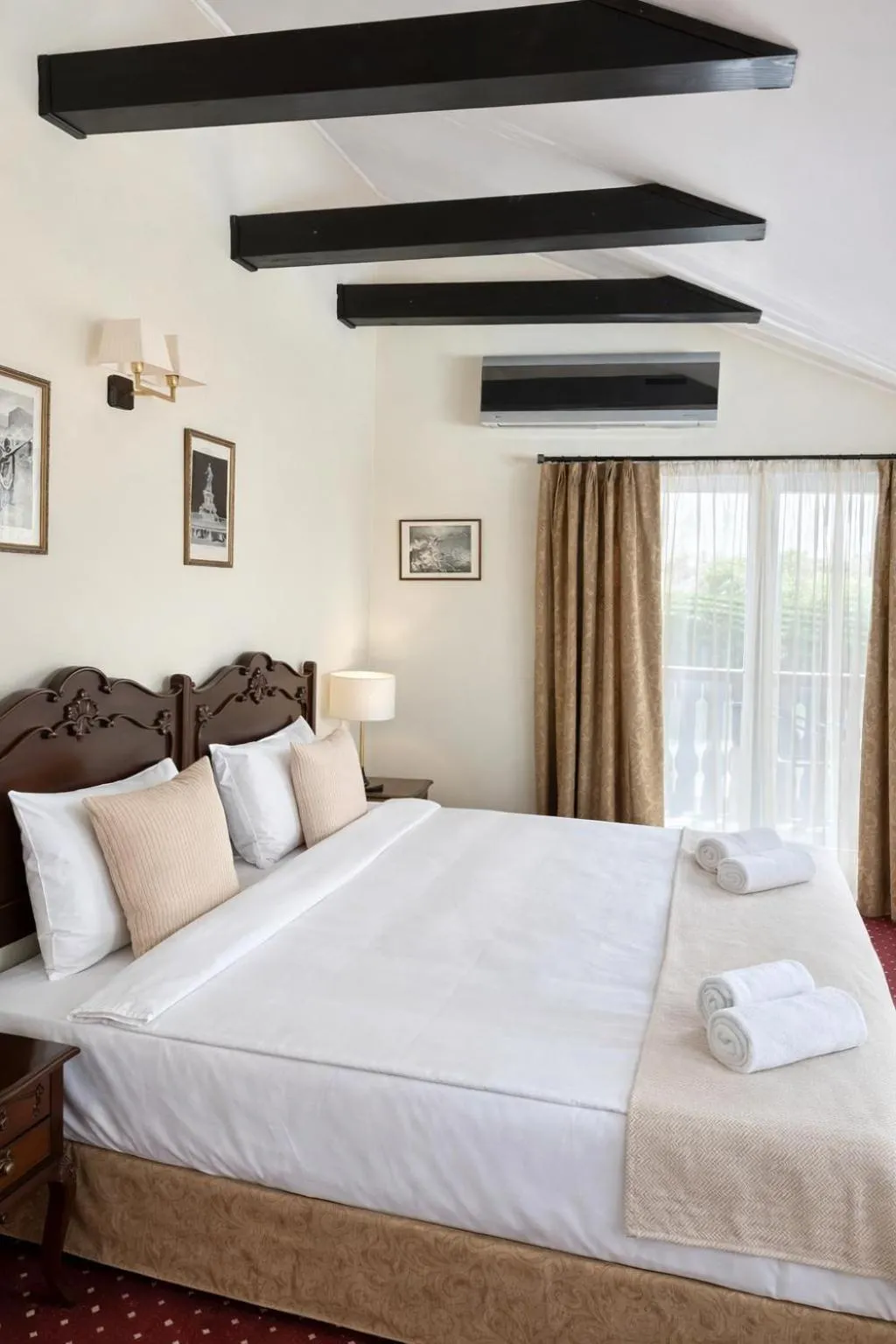 Bed in Classic Inn Hotel