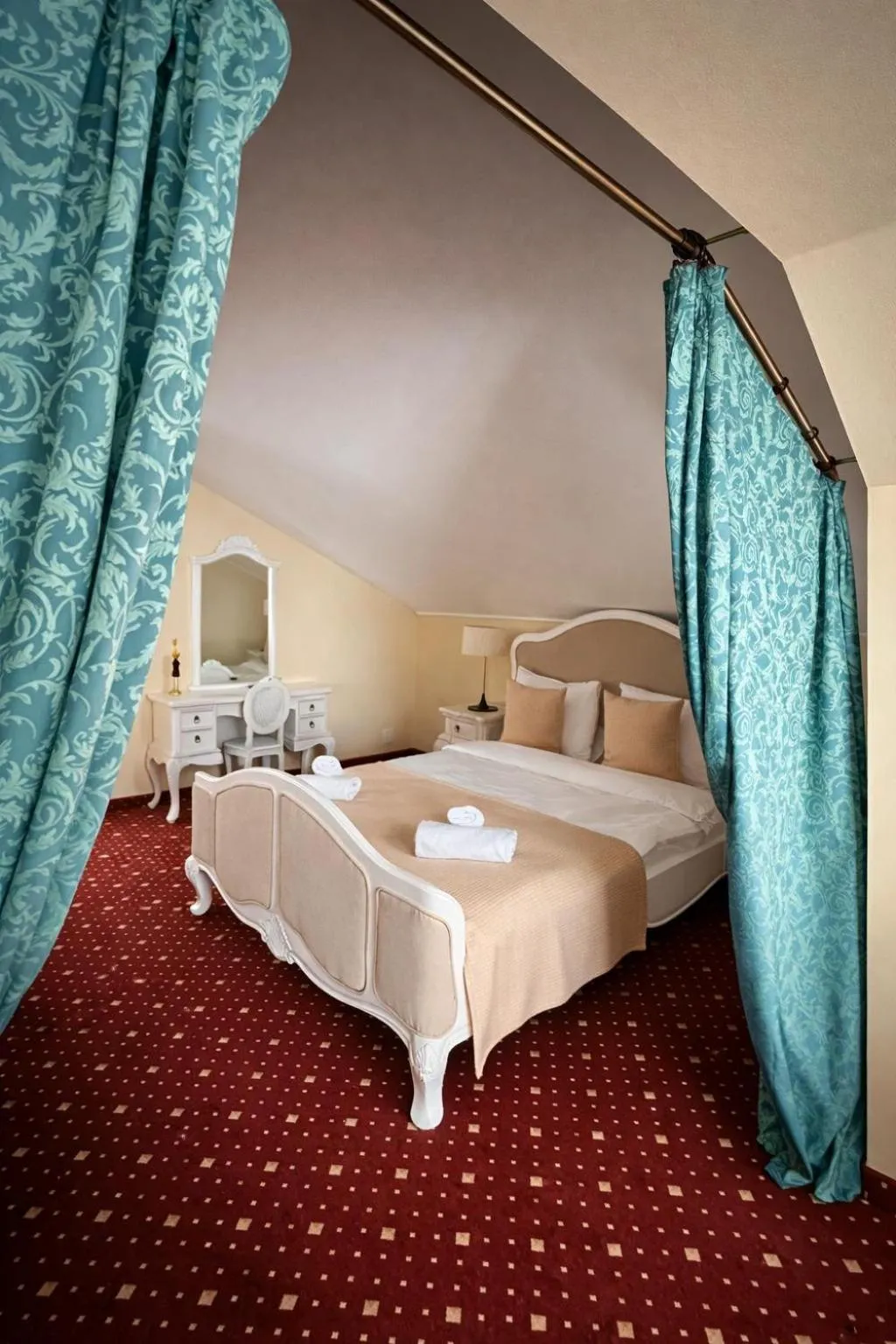 Bed in Classic Inn Hotel