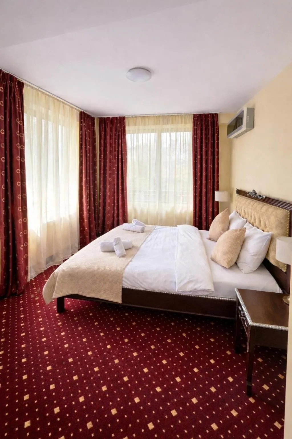 Bed in Classic Inn Hotel