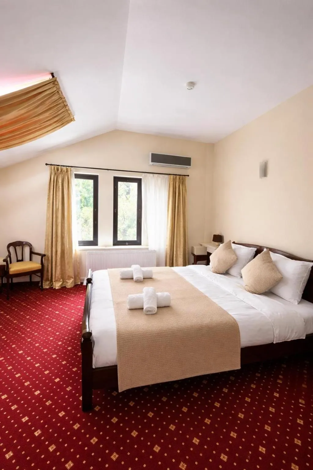 Bed in Classic Inn Hotel