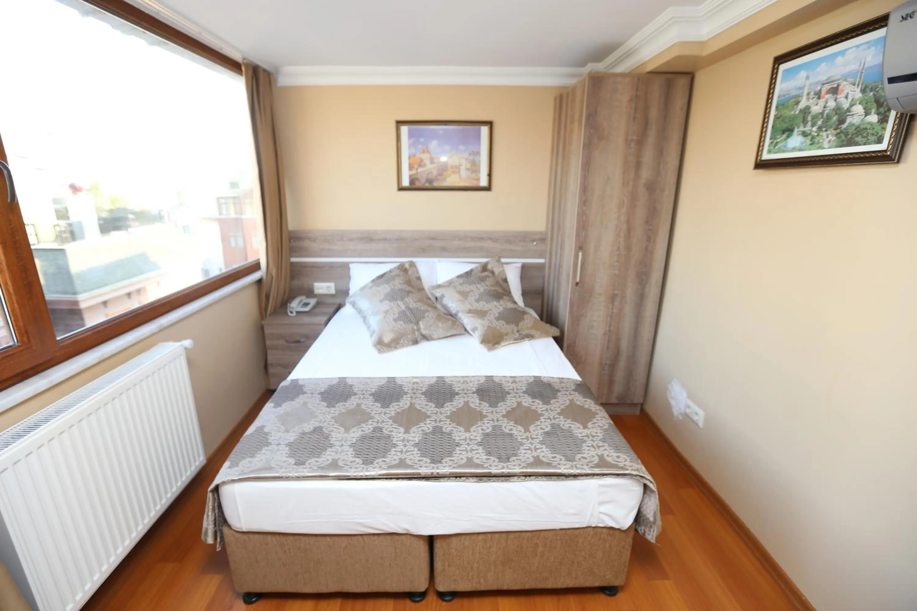 Bed in My Holiday Time Hotel