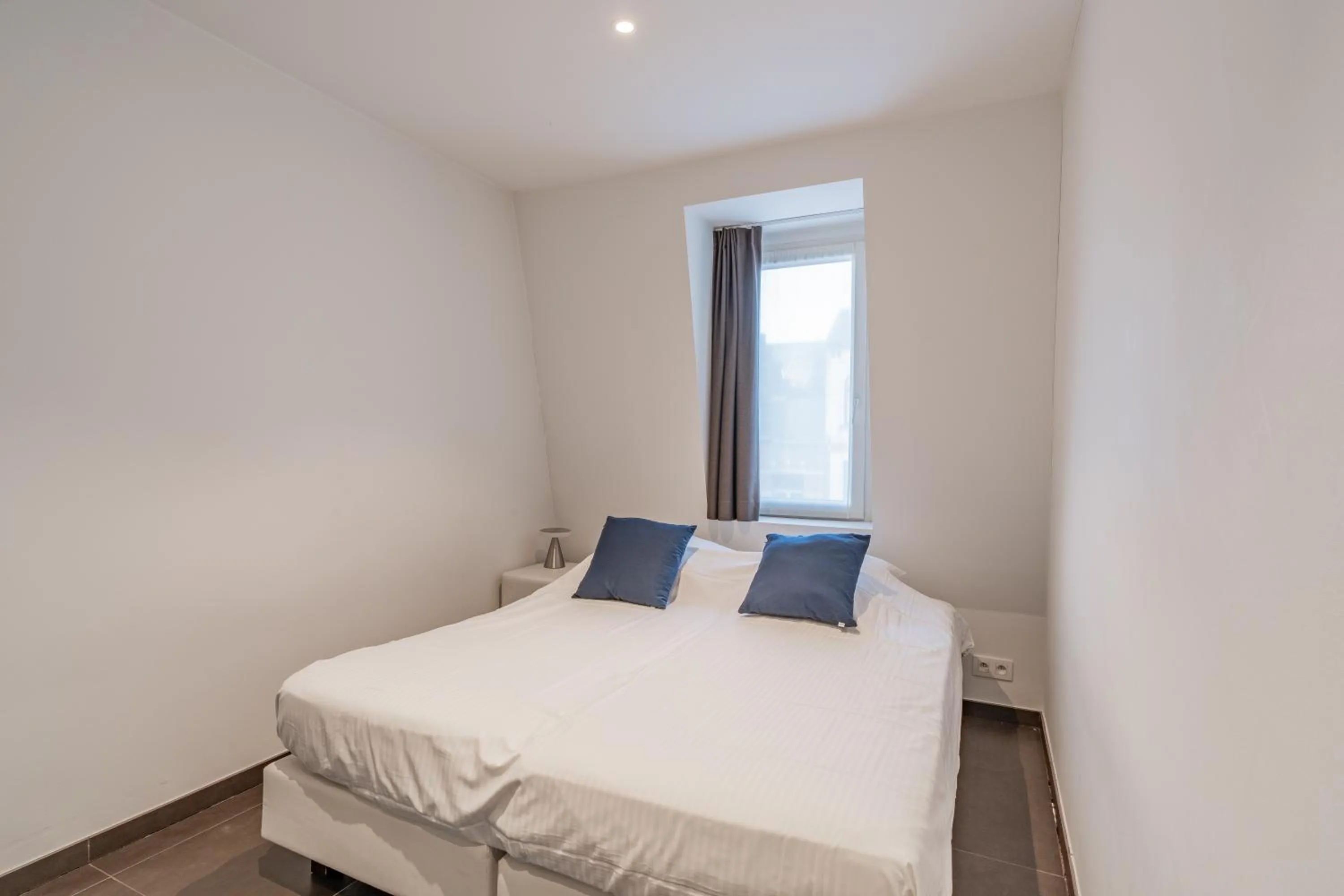 Bed in Maison Bruges