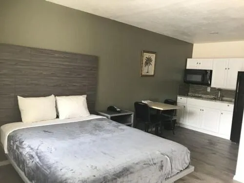 Bed in Paris Extended Stay Suites