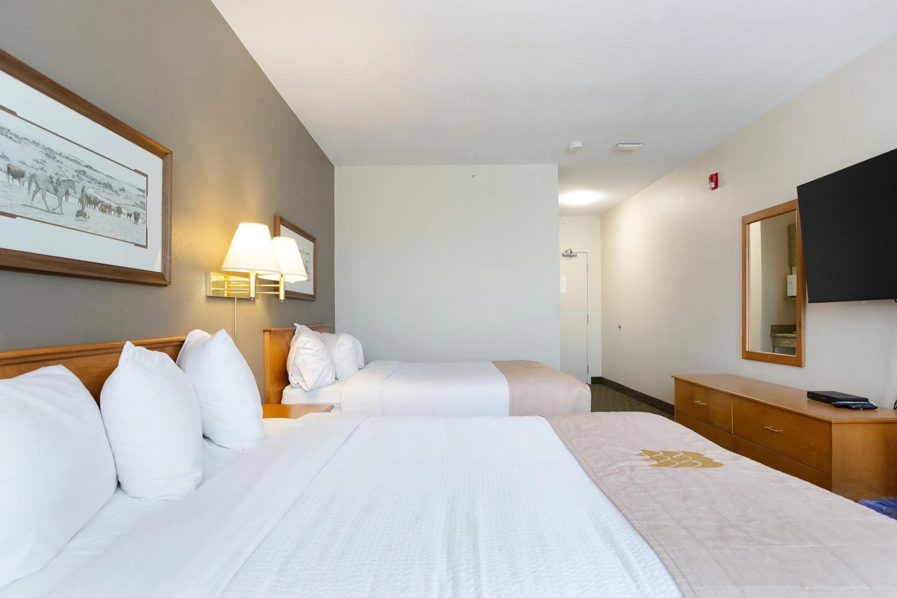 Bed in Lakeview Inns & Suites - Okotoks