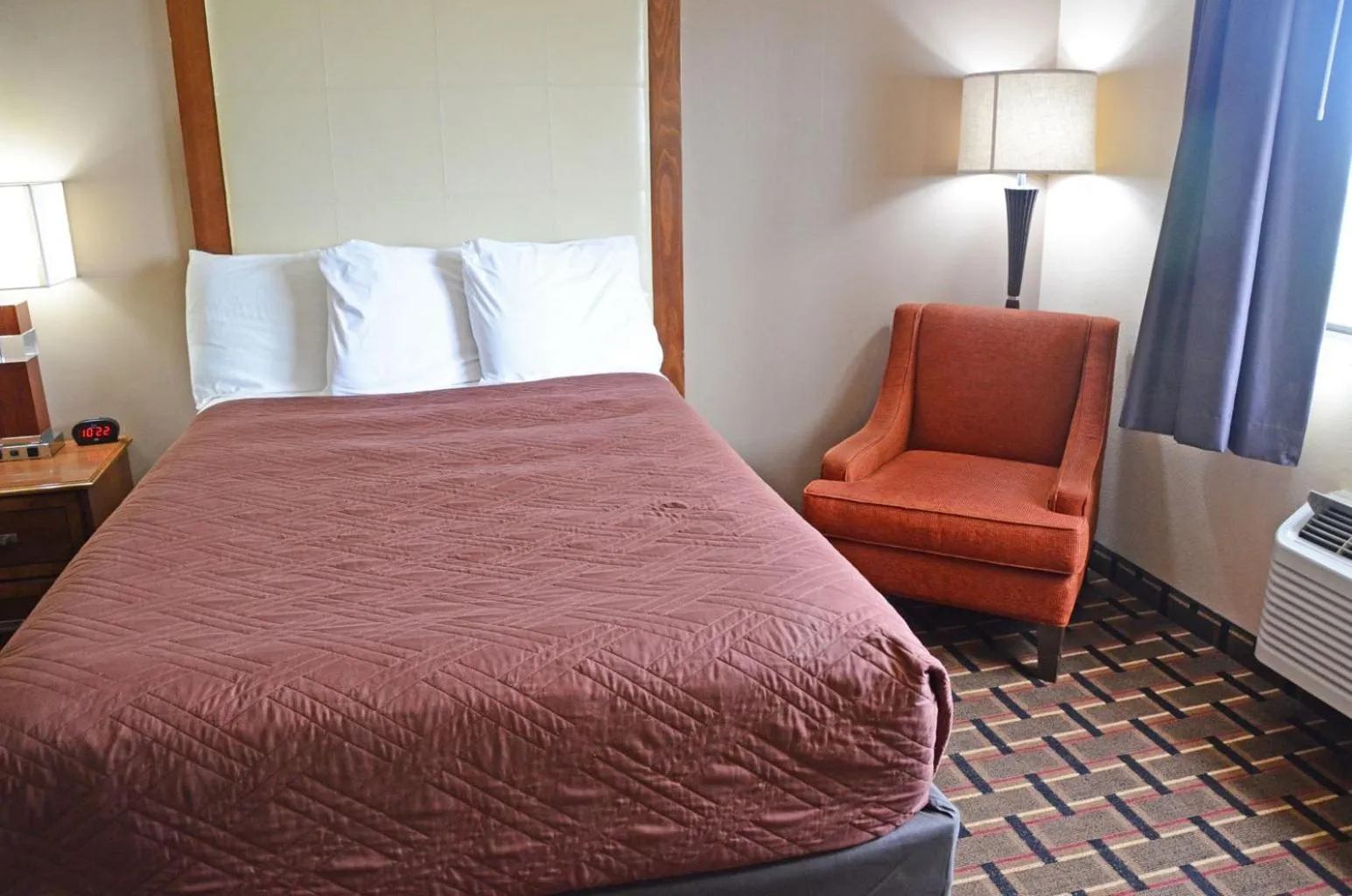 Bed in Heritage Grand Inn