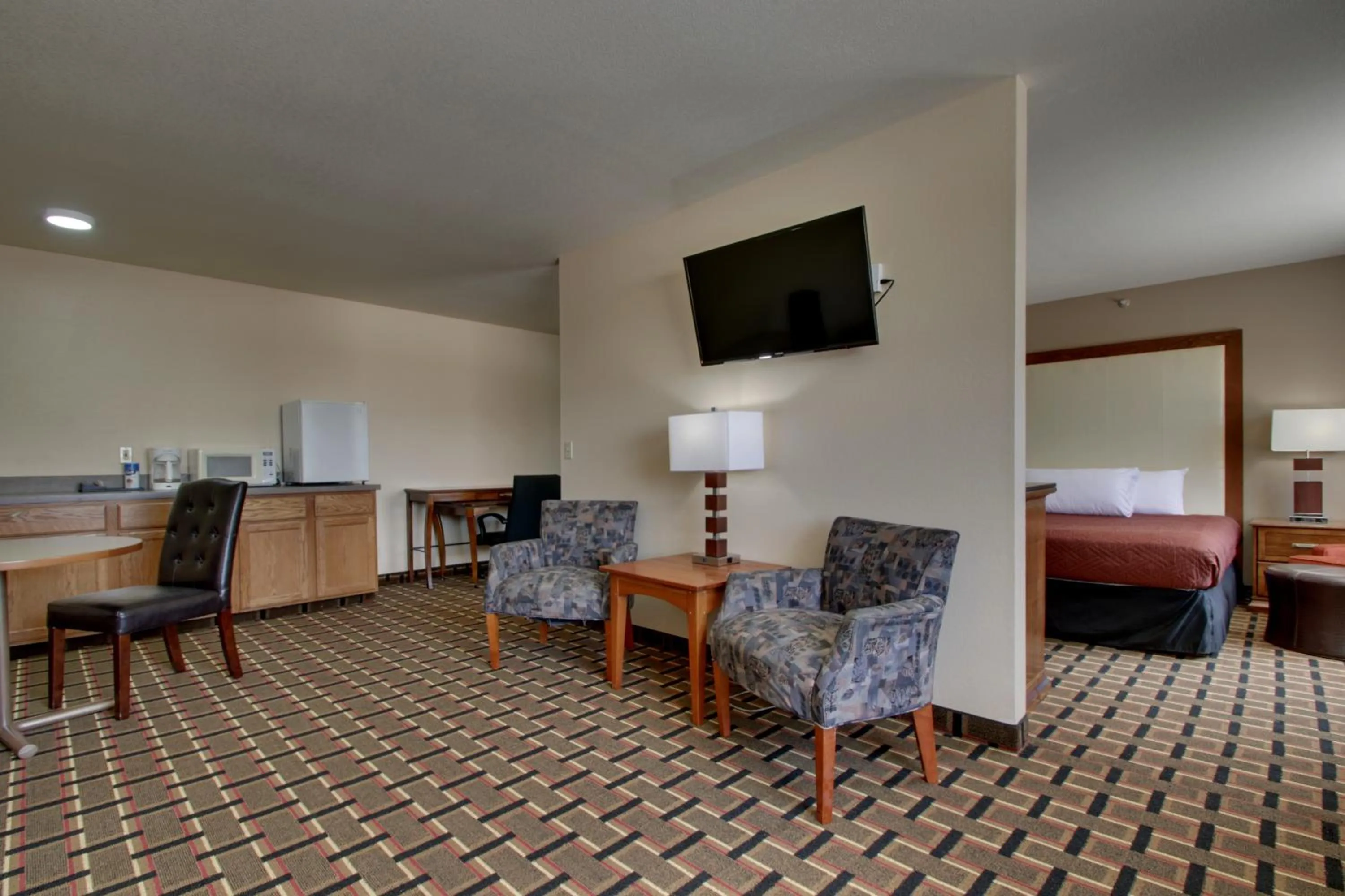 Living room, Bed in Heritage Grand Inn